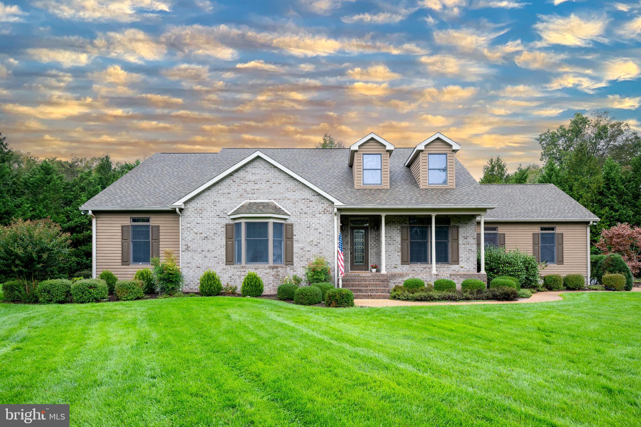 Welcome to 29 Hidden Hills Drive | Rivers End, Seaford, DE.  Located in Seaford’s prestigious Rivers End community, this beautifully maintained one-owner home offers exceptional comfort, quality, and functionality. With fresh paint throughout and a unique take on the split floorplan, this property is move-in ready and full of thoughtful design features.  Step through the welcoming foyer, where you'll find a formal dining room to your right, perfect for entertaining. To the left, a private hallway leads to two generously sized bedrooms that share a Jack and Jill bathroom, along with a spacious laundry room.  At the heart of the home is a well-appointed kitchen, featuring a center island, Corian and quartz countertops, and extensive cabinetry and counter space. The breakfast area opens into the expansive great room, highlighted by cathedral ceilings, a gas fireplace, and custom built-in cabinets. A large sunroom just off the great room provides direct access to the paver patio with retractable awning, offering the perfect space to relax or entertain.  The primary suite, located privately off the great room, boasts two walk-in closets, a luxurious bath with custom tile shower, dual vanities, and a separate water closet.  Additional interior highlights include:  A dedicated office with a separate garage entrance,  convenient half bath,  two large hall closets, ideal for pantry or storage use,  and massive unfinished attic space accessed via full stairway.  Car enthusiasts or hobbyists will be amazed by the 26’x46’ fully finished 3-car garage, complete with epoxy flooring and ample room for tools, vehicles, or workspace. A detached shed offers even more storage.  Outside, the landscaped yard features mature plantings, full irrigation, and landscape lighting, all set on a generously sized lot with an extra-wide paved driveway for easy access and maneuvering.  Enjoy year-round comfort and energy efficiency thanks to geothermal HVAC and the cost-saving benefits of the Delaware Electric Cooperative.  Don’t miss your chance to own this exceptional home in one of Seaford’s most desirable neighborhoods. Schedule your private tour of 29 Hidden Hills Drive today!