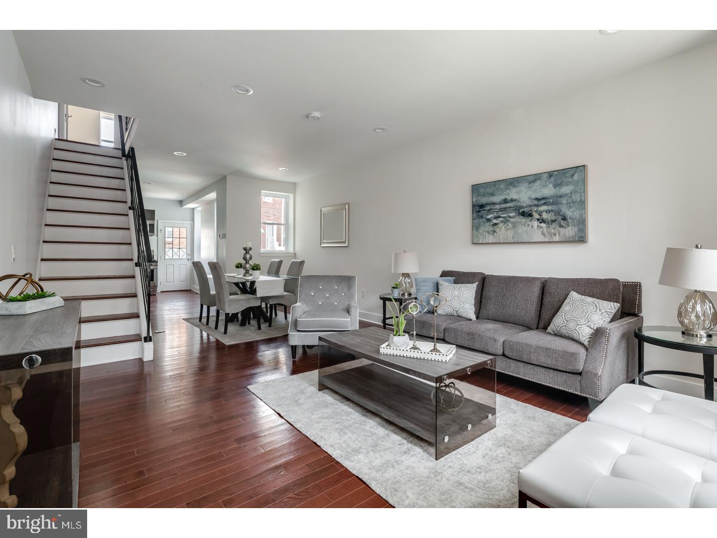 Welcome to 825 Belgrade St, a charming brick front row featuring 3 beds, 1.5 baths, and over 1500 sq ft of living space, nestled on a quaint tree lined tree in the heart of burgeoning Fishtown.  This home has been completely renovated and boasts many modern amenities such as central air, fully finished basement, gorgeous hardwood floors throughout, and state-of-the-art fixtures and finishes. The main level is an open concept living/dining/kitchen space with great natural light, high ceilings, and recessed lighting. Upstairs you will find 3 spacious bedrooms, all with ample closet space as well as a custom tiled full hall bath with twin sink and soaking tub/shower. Rear patio off the kitchen provides a great space for starting your urban garden or doing some grilling & chilling. The finished basement offers a convenient powder room, along with laundry area, plenty of space for storage, and houses all mechanicals. Conveniently located close to shopping/grocery stores, public trasportation, major roadways, and the numerous amazing gastropubs and restaurants the neighborhood has to offer. We welcome your visit today!