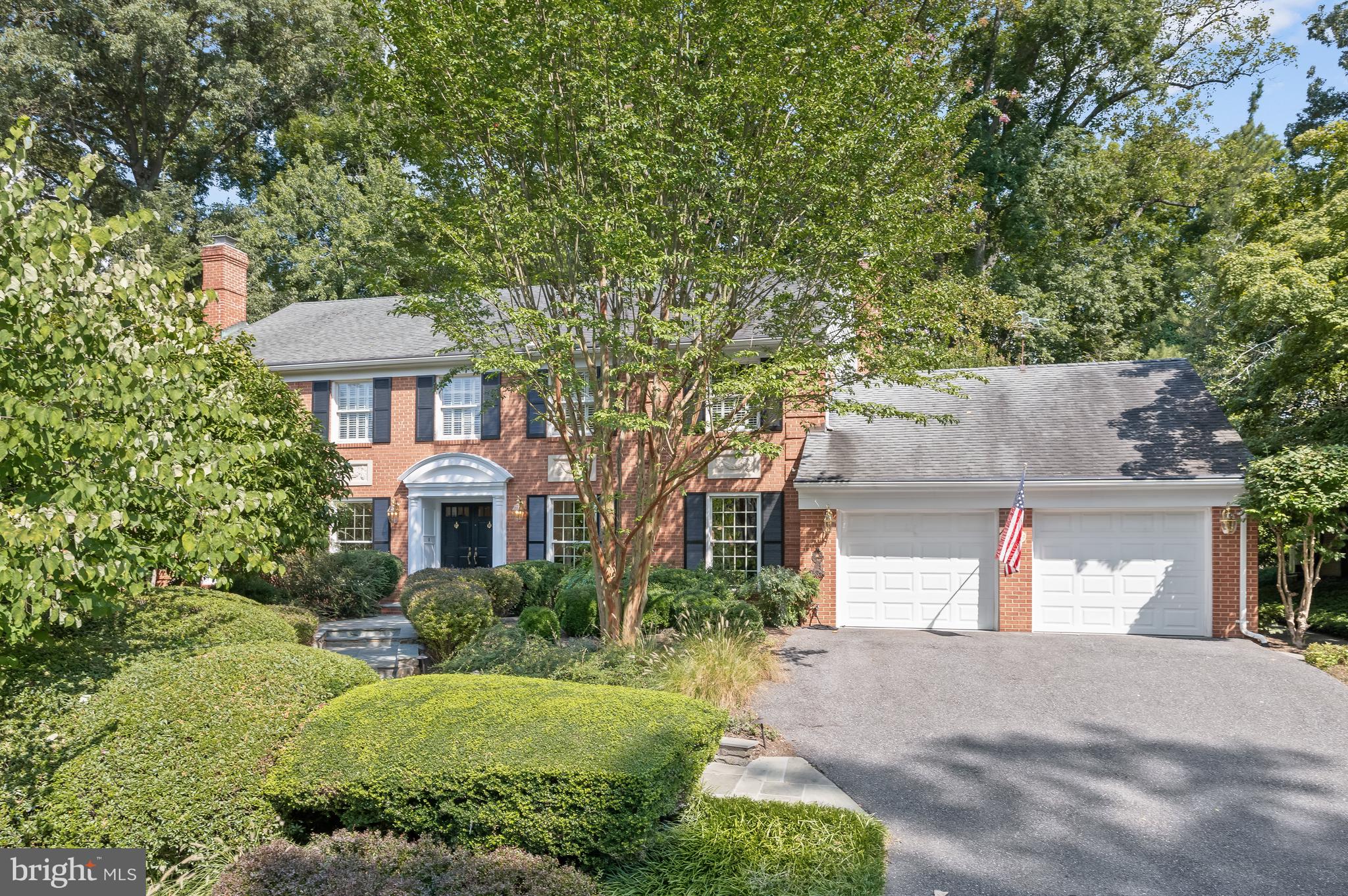 Nestled in a quiet, cul-de-sac in the  friendly Ridgeleigh neighborhood, 8234 Buckspark Lane W presents a timeless  Colonial – sure to capture the hearts and minds of all who visit! Built in 1975, this residence offers 4 Bedrooms and 4 Bathrooms across 3 elegantly curated levels and 5,018 square feet of total space, boasting tasteful design notes such as gleaming hardwood floors, dentil crown molding, recessed lighting and chair railings throughout. 

Residents and guests alike will stop to admire the residence’s  curb appeal, showcasing professional landscaping and a slate front walkway with retaining walls. Through the double entry doors, the Entry Foyer awaits, presenting a coat closet, marble tile flooring and a graceful, curved staircase leading to the Upper Level. The Office, with double door entry, presents classic built-in bookcases, track lighting, paneled walls and a built-in couch along one wall; find focus and unlock creativity in this tastefully designed room. The Living Room boasts picture frame molding and a gas fireplace with a slate hearth and a surround, wood mantle; idyllic for family gatherings or to entertain and welcome guests. The Living Room effortlessly opens to the Dining Room, showcasing a classic chandelier, double doors leading to the Gourmet Kitchen and elegant French doors leading out to the Screened Porch. The Gourmet Kitchen presents the ideal space for any at-home chef, including an island, granite countertops and a china closet. Enjoy your morning coffee or tea in the charming Breakfast Room, complete with a rattan chandelier and a glass slider door to the Terrace. The Family Room opens effortlessly to the Kitchen and boasts walls of windows and a gas fireplace with stone surround, a slate hearth and a wood surround and mantle; make countless new memories with friends and family in this  comforting spot. The Screened Porch, accessed from Dining Room or Kitchen, boasts cathedral ceilings, 2 ceiling fans, slate flooring and a screened door leading to the Terrace; the perfect spot to watch the leaves change at the start of the Fall season. The Laundry/Mudroom offers Garage and Rear Yard access, tile flooring, a broom closet, a washer and dryer, cabinets, a utility sink and a greenhouse window. The main level is complete with a Full Bath, presenting marble tile flooring, a stall shower and granite counters. 

Ascending to the Upper Level, the Hall presents a wrought iron railing, a lovely modern light fixture and a linen closet. The spacious Primary Bedroom Suite will check every box on your wish list, showcasing 3 closets, a spa-like, ensuite Primary Bath and double doors leading to a sizable Sitting Room/ Optional Fifth Bedroom. The Primary Bath boasts interior shutters, a double vanity, and a separate room with a stall shower, and a Toto toilet; enjoy well-earned relaxation in the comfort of your own home in this peaceful oasis. The Upper Level includes 3 additional Bedrooms, all offering a closet and ceiling fan. The Second Bedroom also includes an ensuite Full Bath with tile flooring, a single vanity with granite countertop, a tub shower with tiled surround, a vanity light, a mirrored medicine cabinet and Hall access. The Fourth Bedroom includes a second closet. The Upper Level’s offerings are complete with a Rear Hall closet and Full Hall Bath with tile flooring, a Toto toilet, a long vanity, vanity lighting, interior shutters and a tub shower with tile surround. 

Descending to the unfinished, Lower Level, complete with a utility sink, residents will find a blank canvas for design; from a Recreation Room to a Fitness Center, the options for this space are endless! 

The slate Terrace with retaining walls and an upper garden area, offers a lovely al fresco dining and entertainment setting and a space to use your green thumb.

In close proximity to local parks, trails and the popular Potomac Village Shopping Center, 8234 Buckspark Lane W gives a whole new meaning to residential bliss!