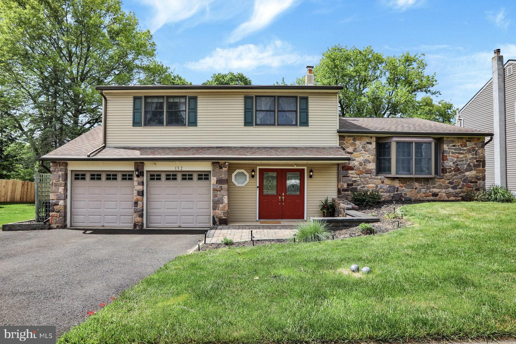 Beautifully situated in the award-winning Neshaminy School District, this spacious four-bedroom home with a two-car garage and basement offers the perfect blend of comfort, convenience, and natural beauty.

Gather in the inviting family room and cozy up by the stunning stone-hearth wood-burning fireplace on chilly winter evenings. Natural light pours through the sliding glass doors, showcasing the picturesque backyard and beautiful stone patio. Imagine starting each morning with a cup of coffee while overlooking your gardens, watching deer, foxes, and wild turkeys, and listening to the peaceful sounds of birdsong.

The spacious two-tier walk-up attic, envisioned by the builder, offers the potential to be finished into an approximately 19’ x 16’ fourth bedroom, private home office, or bonus living space.

A true hidden gem, this property is ideal for nature lovers and those who love to entertain. The open space directly beyond the backyard provides the perfect setting for large gatherings, picnics, volleyball, or a game of catch with family and friends.

Looking for adventure? A scenic 10-minute hike through the woods leads to a natural section of Neshaminy Creek—an ideal spot for fishing, catching tadpoles, or simply enjoying a peaceful walk surrounded by nature.

Conveniently located just minutes from Newtown Borough, with easy access to New Jersey, Philadelphia, and New York City, this exceptional home offers the tranquility of nature without sacrificing convenience.
Enhanced by AI staging.