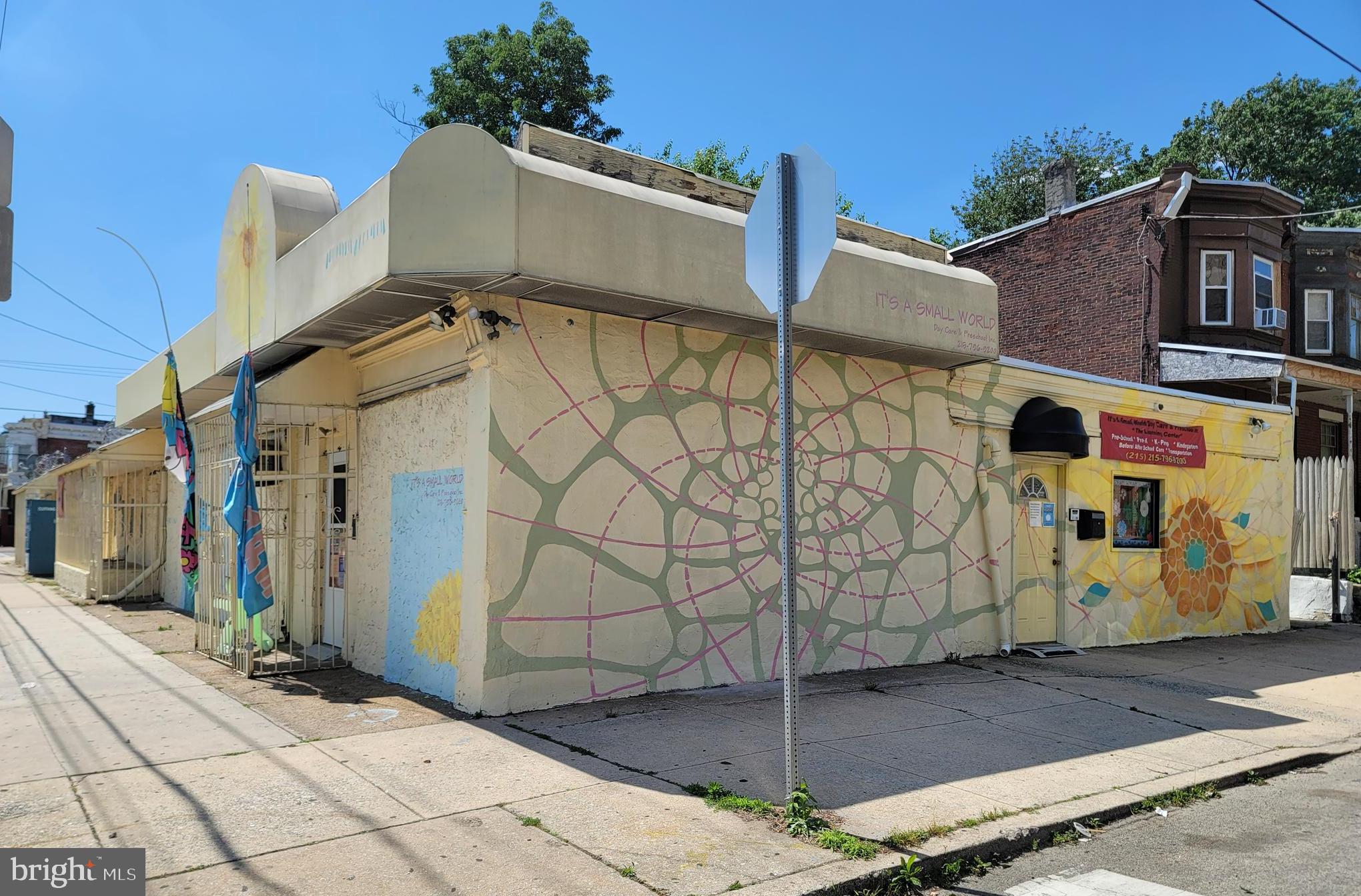 1500–1504 N. Peach Street presents a fully leased, income-producing commercial property in Philadelphia’s 19131 submarket. This is a legally zoned daycare, 100% occupied by a long-term daycare tenant, offering investors a stabilized asset with durable tenancy, functional building improvements, and recent capital investment.
The property consists of approximately 3,888 SF plus a 380± SF garage, for a total of approximately 4,268 SF, situated on a 4,856± SF lot with 50 feet of frontage. Zoned CMX-2, the asset supports flexible neighborhood commercial use and benefits from its established daycare occupancy, efficient single-tenant layout, and strong accessibility.
Recent improvements include interior updates completed in 2026, updated flooring, security gates, camera systems, an annually inspected fire alarm system, and a newly improved Versico roof coating system installed by a Versico Authorized Contractor. The roof scope includes new scupper boxes, drainage improvements with tapered insulation at both drains, lowered drains, edge metal work, and a Versico coating system backed by a 10-year manufacturer warranty and 2-year contractor labor warranty.
The building is zoned and approved for continued daycare operations, with six means of egress, two kitchens, five bathrooms, dedicated garage/storage functionality, and outdoor yard access. With very walkable positioning, excellent transit access, and bikeable connectivity, 1500–1504 N. Peach Street offers a compelling combination of stabilized cash flow, recent capital improvements, and neighborhood-serving commercial utility.