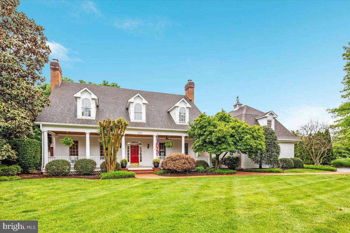 Don't miss your opportunity to tour this incredible home in person! From its beautiful finishes to its inviting spaces, this property is one you won't want to miss. Stop by Saturday 6/21 between 1:00 PM and 3:00 PM—we'd love to see you there!

Experience true luxury living in this magnificent custom estate nestled within the prestigious gated golf community of Lake Manassas. From the moment you arrive, you are welcomed by lush landscaping and a charming brick walkway leading to the expansive covered front porch. Accented with cedar board ceilings, this picturesque outdoor space serves as a seamless extension of the home which is perfect for morning coffee, evening cocktails, and year-round enjoyment. Meticulous craftsmanship and exceptional design blend effortlessly to create a home that is elegant, modern, and inviting. Inside, the grand two-story foyer opens to gleaming hardwood floors, custom built-ins, pocket doors, archways, and crown molding throughout. The thoughtfully designed floor plan offers spacious, sun-filled living areas including formal living and dining rooms, a powder room, and two wood-burning fireplaces. The gourmet chef’s kitchen is beautifully appointed with a Sub-Zero refrigerator, 6-burner Thermador gas range, and dishwasher, complemented by quartz countertops, premium cabinetry, a large center island, butler’s pantry, and walk-in food pantry. Four sets of custom French doors and multiple skylights bright plenty of natural light into the home while showcasing serene backyard views. Outdoor entertaining is effortless with the expansive deck and built-in stone cooking area. The main-level owner’s suite is a true retreat featuring private outdoor access, vaulted ceilings, and an oversized walk-in closet. The spa-inspired primary bath offers a freestanding soaking tub, dual vanities, rainfall shower, and heated floors. Upstairs, four generously sized guest bedrooms are served by three recently renovated full baths. An additional flexible living space is ideal for a recreation room, playroom, media room, or home office.
The fully finished lower level is truly a showstopper, featuring a full wet bar, impressive 650-bottle wine cellar, high-end billiards room, two full baths and one half bath with steam showers, plus a private in-law suite complete with separate entrance/walk-out access, kitchenette, additional laundry room, and spacious living room with gas fireplace. Meticulously maintained, this exceptional residence boasts over $250,000 in upgrades and renovations throughout. Lake Manassas is home to the prestigious Robert Trent Jones Golf Club, host of the 2024 Solheim Cup, as well as the award-winning Stonewall Golf Club. Ideally situated on a premium corner lot just minutes from I-66, Route 28, shopping, dining, and commuter lots, this extraordinary property offers luxury living at its finest. This is a rare opportunity you will not want to miss. Come experience the lifestyle you deserve! Schedule your showing appointment today!