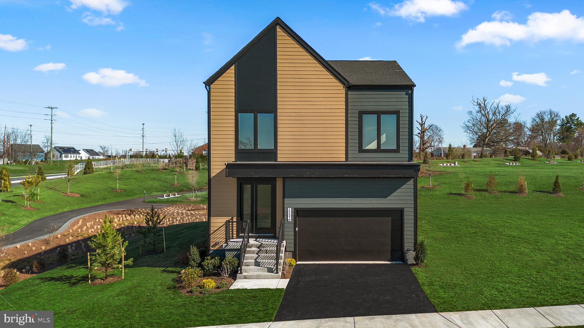 Discover the Sasha 31-F2 in P2 at South 620-a two-car, front-load garage MODERN SINGLE FAMILY HOME BUILDABLE PLAN with up to four bedrooms, up to five full bathrooms, and one half bathroom ready for move in EARLY/SPRING 2027 with deliveries based on build time. Designed for effortless everyday living, this single family floorplan offers four levels of versatile living space, including an upper-level bedroom for added flexibility. Featuring an open-concept layout, a primary suite with a large walk-in closet and soaking tub, and secondary bedrooms each with their own walk-in closets. The Sasha 31-F2 offers build-to-order opportunities on select homesites, allowing you to personalize your new home. Explore a variety of professionally curated interior design packages at different price points to match your style and budget. Certain homesites also offer optional structural enhancements. Contact a Van Metre Sales Advisor to learn how you can bring your vision to life! Being a new build, your home is constructed to the highest energy efficiency standards, includes post-settlement warranty, and has never been lived in before! Don't miss out on this opportunity to own a home that combines modern, thoughtful design, and a prime location—get in contact with our Sales team today for more information! Take advantage of closing cost assistance by choosing Intercoastal Mortgage and Walker Title.-----Discover a place to plant your roots in P2 at South 620, an extraordinary neighborhood thoughtfully designed for connection and modern living. Nestled in Aldie, P2 at South 620 offers convenient access to shopping, dining, top-rated education, outdoor recreation, and Dulles International Airport-ensuring you're well connected to everything Northern Virginia has to offer. Positioned off Braddock Road, Aldie's newest neighborhood features nature-inspired green spaces, pollinator and rain gardens, a tot lot, and walking trails. At P2 at South 620, you’ll become part of a welcoming community, defined by the warmth and camaraderie of its residents who proudly call it home. Residents may opt into an additional annual fee to enjoy the nearby  amenities of Prosperity Plains, a Van Metre community, featuring a pool, clubhouse, gym, and meeting space.-----*Homes for other delivery dates may also be available. Pricing, offers, and availability are subject to change without notice. Images, renderings, and site plans are for illustrative purposes only and may not reflect actual homes or features. Some renderings may depict a similar home. P2 at South 620 lies within the Airport Impact Overlay District (within the 1 Mile Buffer). Due to its proximity to Dulles International Airport, this site is subject to aircraft overflights and aircraft noise. Additional Terms and Conditions may apply. Please see a Van Metre Sales Advisor for details.