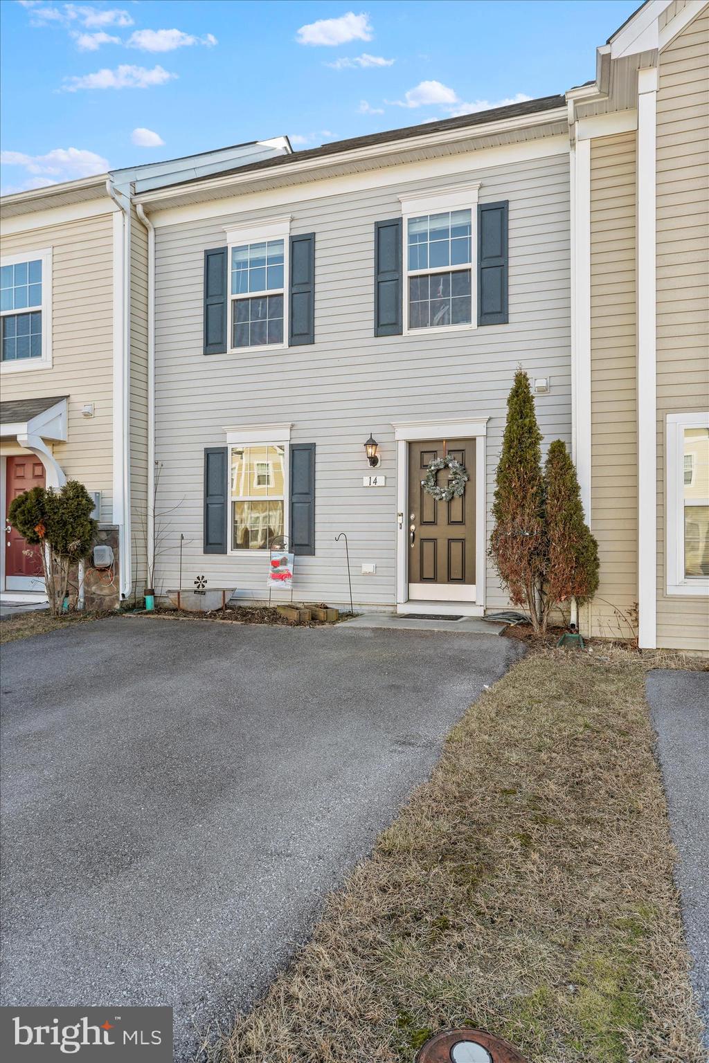 ***** Opportunity for buyer to personalize flooring, seller may offer a credit toward new flooring with an acceptable offer****

Welcome to 14 Teakwood Drive, a well maintained and thoughtfully designed townhome offering comfort, functionality, and convenience in the heart of Martinsburg. This 3-bedroom, 2.5-bath home features a spacious and inviting layout ideal for everyday living and entertaining.

The main level offers an open and practical floor plan with a comfortable living area, a well-appointed kitchen, and a dining space that flows seamlessly for gatherings or quiet evenings at home. Upstairs, you’ll find three generously sized bedrooms, including a primary suite with a private en-suite bath, providing a relaxing retreat. An additional full bath serves the remaining bedrooms, while a convenient half bath is located on the main level.

With low-maintenance living and a location close to shopping, dining, schools, and commuter routes, this townhome is an excellent opportunity for homeowners or investors alike. Schedule your showing and see all that 14 Teakwood Drive has to offer.