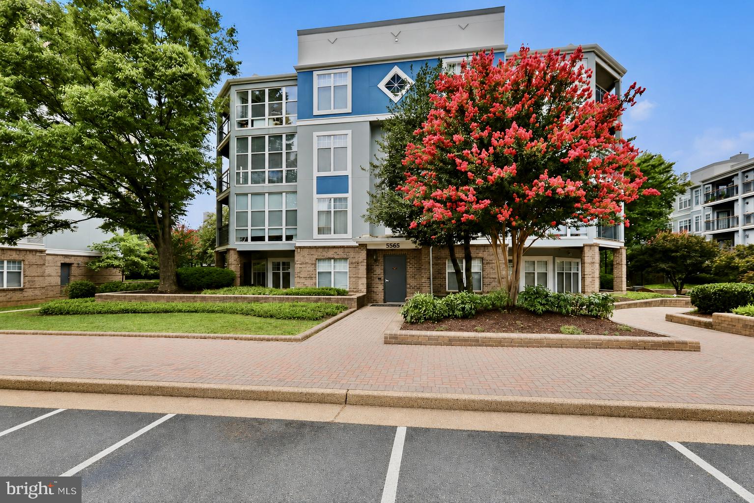 Welcome to Savoy Park! Two assigned garage parking spots (a rarity in the area)This bright and beautifully maintained 1-bedroom, 1-bath condominium offers the perfect blend of comfort, convenience, and location in the heart of Falls Church. The open-concept living and dining area is filled with natural light and flows seamlessly into the well-appointed kitchen featuring gas cooking, ample cabinetry, and generous counter space. The spacious primary bedroom boasts a large walk-in closet, while the in-unit stacked washer and dryer add everyday convenience. Enjoy your own private balcony overlooking peaceful greenery, creating the perfect spot to relax. This secure elevator building includes outstanding amenities such as an outdoor pool, fitness center, clubhouse, extra storage, and beautifully maintained common grounds. Rarely available, this unit also comes with two assigned garage parking spaces. Enjoy the free  shuttle service. Ideally located just minutes from I-395, I-495, Metrobus, the Pentagon shuttle, shopping, dining, and the Mark Center, this home offers an easy commute to Washington, D.C., Old Town Alexandria, Arlington, and beyond. Whether you're a first-time buyer or downsizing, this move-in-ready condo is one you won't want to miss!