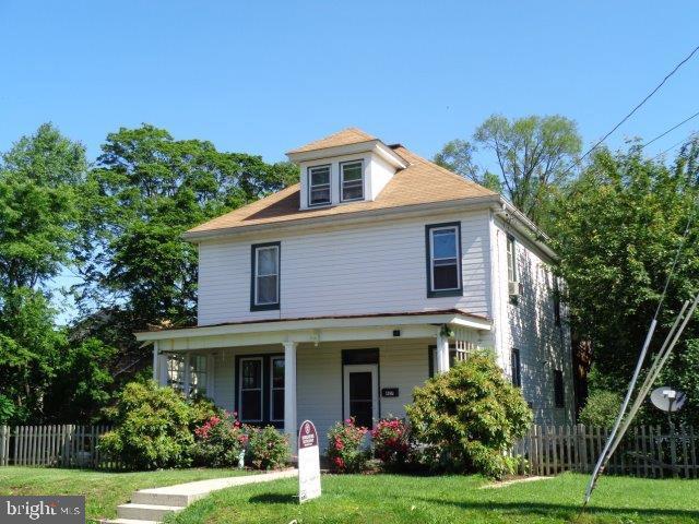 Large 2-story home at the end of the street for a quiet setting. Walk-up attic for storage, wood floors throughout most of home, vinyl-clad replacement windows, screened-in rear porch, rear wood deck, gas hot-water baseboard heat and much more. See associated docs for additional info.