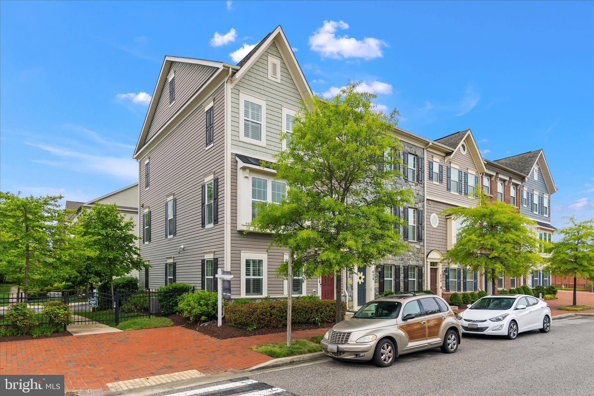 Back on the market. Buyer’s financing fell through at last minute.  Now you have a second chance to make this large, move-in ready townhome your own. Super clean! Side windows on this end-of-group beauty give this unit an even better bright and open feel. Three finished levels with beautiful wide hardwoods. Gourmet eat-in kitchen with granite countertops, two tiered island with sink, newer dishwasher, refrigerator and microwave.  Primary bedroom suite with large walk-in closet with storage system. Primary bathroom with shower and separate soaking tub. Two car garage! Convenient bedroom level laundry room with newer washer and dryer. Custom plantation shutters throughout. Large composite deck off of kitchen.  Wide crown moldings. Architectural details. Recessed lighting. Versatile neutral colors.  New garage door opener. Walkable to shopping, restaurants and Annapolis amenities.  Convenient to transportation hubs.