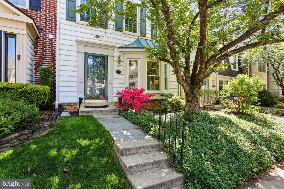 Bright and inviting, this well-maintained three-level townhouse has been freshly painted throughout, including the utility basement floor. Recent updates include new lighting fixtures (2026), kitchen appliances (2026), and replacement windows (2022).
The main level features hardwood floors and an open-concept living and dining area. The separate kitchen offers a wood-burning fireplace and direct walk-out access to a fully fenced backyard complete with a deck and built-in benches.
This home offers four bedrooms and three and a half bathrooms. Three bedrooms are located on the upper level, while a fourth legal bedroom is situated on the fully finished lower level. The lower level also includes a full bathroom, a spacious recreation room, and a laundry, utility, and storage area.
Upstairs, the primary suite boasts high ceilings, a walk-in closet, and a private en-suite bathroom. Two additional bedrooms, a full hall bath, and a linen closet complete the upper level.
Additional highlights include two reserved parking spaces directly in front of the home and convenient access to Ride-On bus service.
Located in the Holly Pointe subdivision of Montgomery Village, residents enjoy access to parks, trails, lakes, playgrounds, pools, recreational facilities, and community centers.