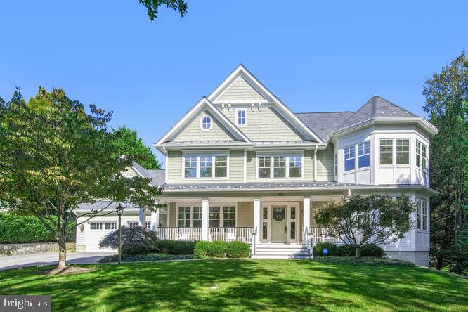 This pristine, quintessential home is one of Potomac's finest with over 8,500 finished SF of living space on three glorious levels – set on a lush, picturesque half-acre graced with mature landscaping. The facade's hardscaping adds to the beauty and curb appeal! The 6-bedroom, 8-bath home boasts an open main-level floor plan with spaces flowing effortlessly from room to room; a fabulous four-season porch that opens onto a flagstone patio and yard; and a finished lower level complete with an in-law or nanny suite, a fully
equipped home theater, a kitchenette and a den with one of the home's 5 gas fireplaces. The classic Frank Bell home features 10-foot ceilings, wide entry and hallways, extensive molding and built-ins, as well as other exquisite architectural details and finishes that add elegance and comfort to every room. The 2007 home was updated five years ago with refinished walnut floors; fresh paint; and an upgraded kitchen that now features gleaming Quartz countertops and Miele appliances with a sub zero refrigerator and new polished nickel hardware throughout.
A welcoming front porch (with space for 6 large rocking chairs!) greets visitors to the home. Inside, the large two-story foyer has soaring ceilings, a beautiful staircase and wide-plank walnut flooring that extends throughout the main & upper levels. To the right, the living room, or parlor, features crown molding, a fireplace and is filled with lots of natural light thanks to the windows
lining the walls. The formal dining room sits to the entry's left and boasts extensive molding including chair rail & wainscoting, and a quad of front windows looking out to the porch. A study off the front hall has French doors and a warm feel with a gas fireplace flanked by built-in bookcases, as well as a triple-paned window. A butler's pantry with glass-front cabinets sits off a short hall connecting the dining room and kitchen. A huge Quartz-topped center island, white cabinetry and Miele appliances including double wall ovens and a 6-burner gas stove equip the gourmet kitchen, which also features a walk-in pantry, plenty of planning and storage space, and an over-the-sink window. The attached breakfast room is bright & airy with windows and glass sliders along the walls. The left sliding doors access the expansive flagstone patio that includes a covered area; the other set of sliders open onto the porch with recessed lights and an
overhead fan. This porch can be screened-in during the warmer months to enjoy those gentle breezes. The lush backyard is leveled and ideal for a future pool should the new owners desire! The kitchen flows into the great room, which lives up to its name with high ceilings, another gas fireplace flanked by windows, a wall of built-ins, and dual sets of glass doors to the rear porch. A large mudroom on the other side of this level has a built-in bench unit for coats and shoes, and contains a second half-bath with a granite-top vanity, a walk-in closet and access to the attached 4-car tandem garage. A second exit door here leads back to the front porch & driveway. A powder room with a custom vanity off the entry hallway, as well as a secondary staircase to the lower level round out this expansive level.
The stairs off of the foyer rise up to the top level, where the large landing area offers a triple window overlooking the front Five bedroom suites including the owner's. The elegant owner's suite features a huge sitting room with a gas fireplace and a triple side window; a bedroom area with windows on two walls; and his/hers walk-in closets with extensive built-ins including sets of drawers. The spa-like owner's bath boasts a marble-topped double vanity that spans one wall, a glass-enclosed shower with built-in bench and dual shower heads and a rain shower feature, beautiful tile work, a marble-surround jetted tub, Travertine tile floors, and large windows for lots of natural light. Floor plans are right after viewing pictures of home.