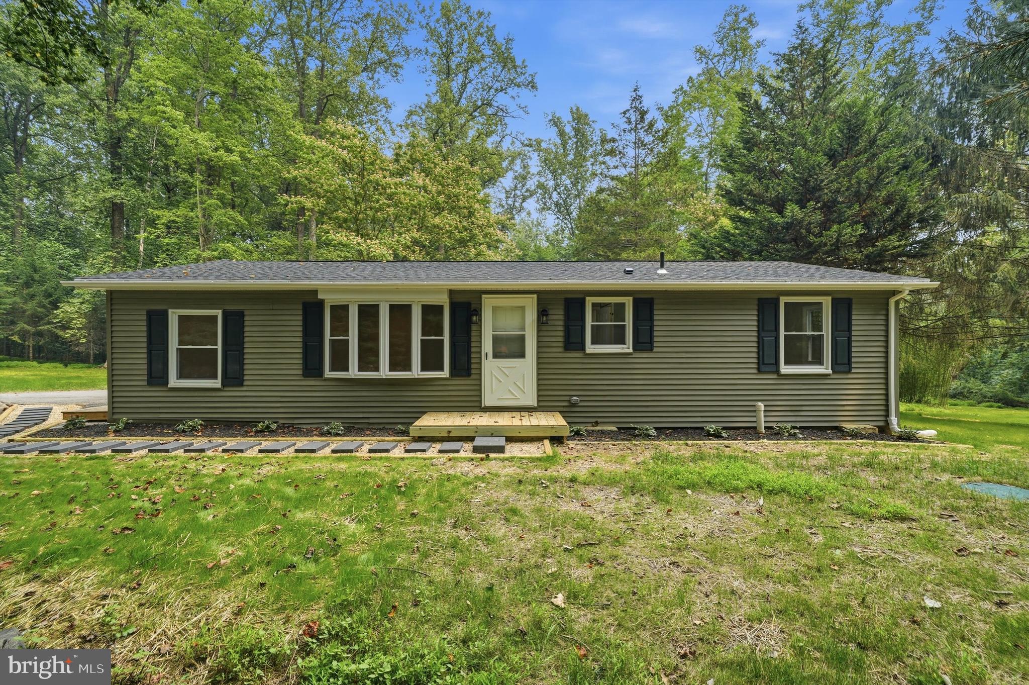Freshly remodeled ranch style home that sits on nearly 2.5 acres in a private, tranquil setting. Bordered by 200+ wooded acreage with abundant wildlife. You'll love relaxing around the new fire pit while enjoying the sounds of nature on those moon-lit nights. Inside you'll find 3 bedrooms, 1.5 baths, new kitchen cabinets w/ quartz countertops, beautifully appointed bathrooms w/ tiled tub/shower, new lvp flooring throughout, recessed lighting and new stainless steel appliances.  Separate laundry room with new front loading washer/dryer and lots of additional cabinetry for storage. New heat pump, architectural shingles and whole house water filtration system. Septic system was inspected and updated with a new 1,500 gallon septic tank and distribution box.  Large 20x12 storage shed to hold all of your gardening and lawn equipment. Lots of mature trees offering potential timbering value (buyer to verify). Close to Rt 340 and Marc train in Brunswick. If you've been looking for your own slice of heaven at an affordable price, this is it!