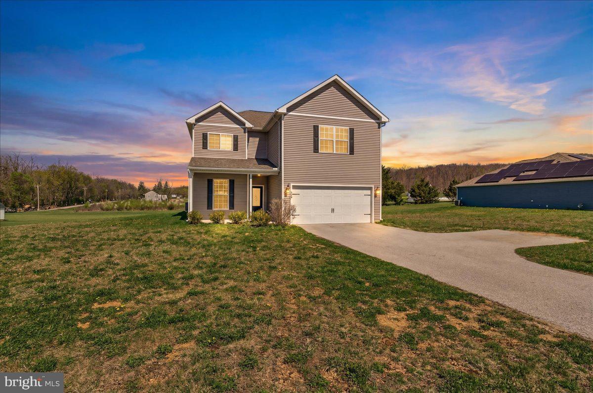 Discover the perfect blend of modern style and expansive living at 78 Vintage Lane. This 2021-built residence features five bedrooms and 2.5 baths across nearly 2,900 square feet of space. The heart of the home is an open-concept chef’s kitchen boasting granite countertops, which flows seamlessly into a bright living area anchored by contemporary flooring. The main-level primary suite offers a private retreat, while the upstairs loft provides a versatile second living area for media, a home office, or whatever you can imagine! For added convenience, the second floor features a dedicated laundry area complete with a Samsung washer and dryer. Set on a 0.86-acre lot within the peaceful Quarry Oaks community, this home also includes a finished two-car garage. Don't miss the chance to make this home yours!