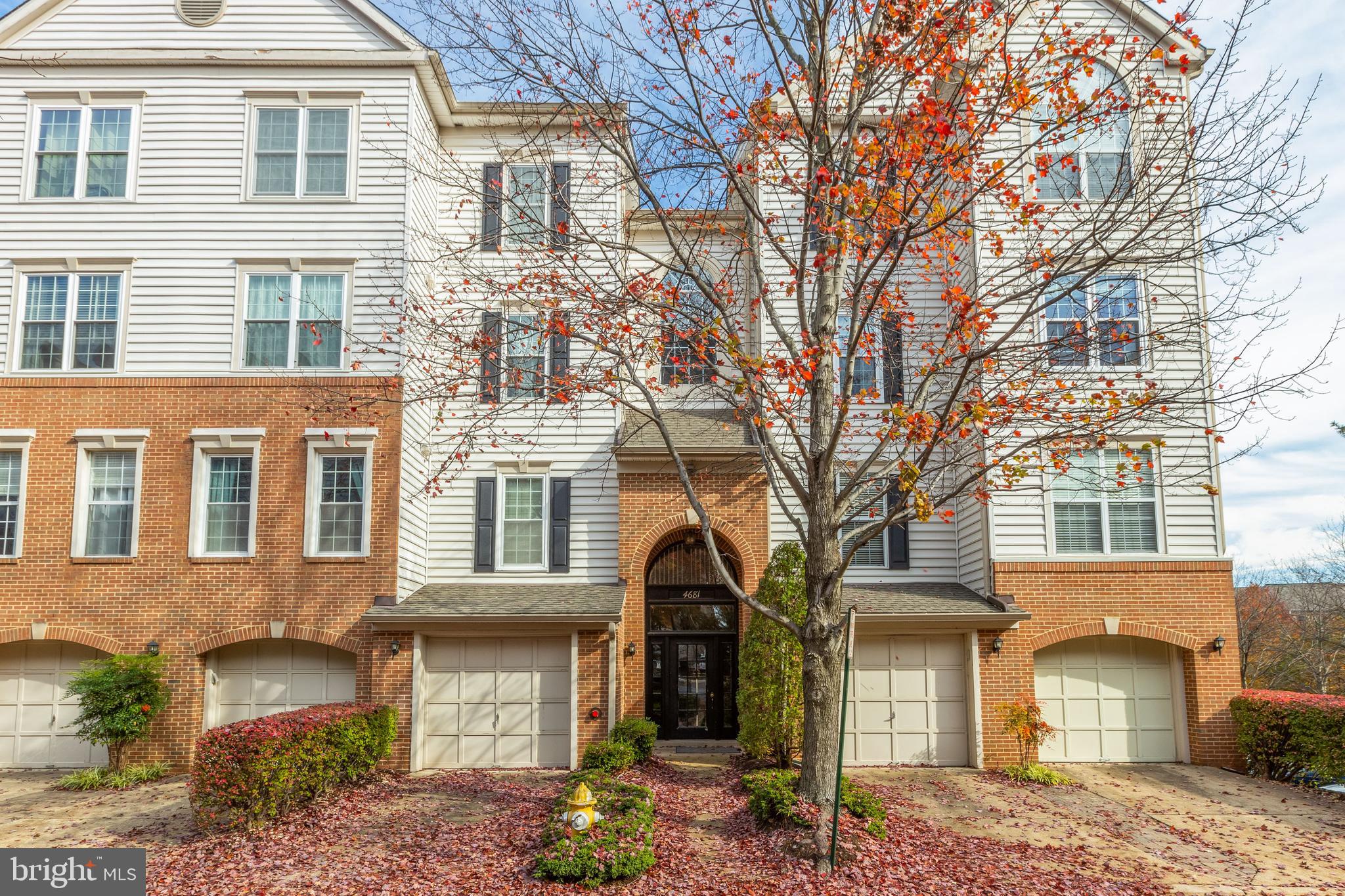 Fabulous bright, sunny 2BR/2BA END UNIT condominium located within the quiet, private community of Stonegate.  High ceilings and tall windows flood the main living area and bedrooms with natural light.  Open floorplan.  Remodeled bathrooms.  New hardwood floors in the main living area.  Kitchen features granite countertops, white cabinets and stainless steel appliances.  Cozy living room with fireplace.  Walk-In Closet in master bedroom.  Private balcony off dining room. Garage space with extra of storage and driveway.  Plenty of guest parking.  All located a short distance from Shirlington, I-395, Old Town Alexandria, Downtown DC, Crystal City and Ronald Reagan Washington National Airport.  Amenities include pool, clubhouse, playgrounds, and green space.