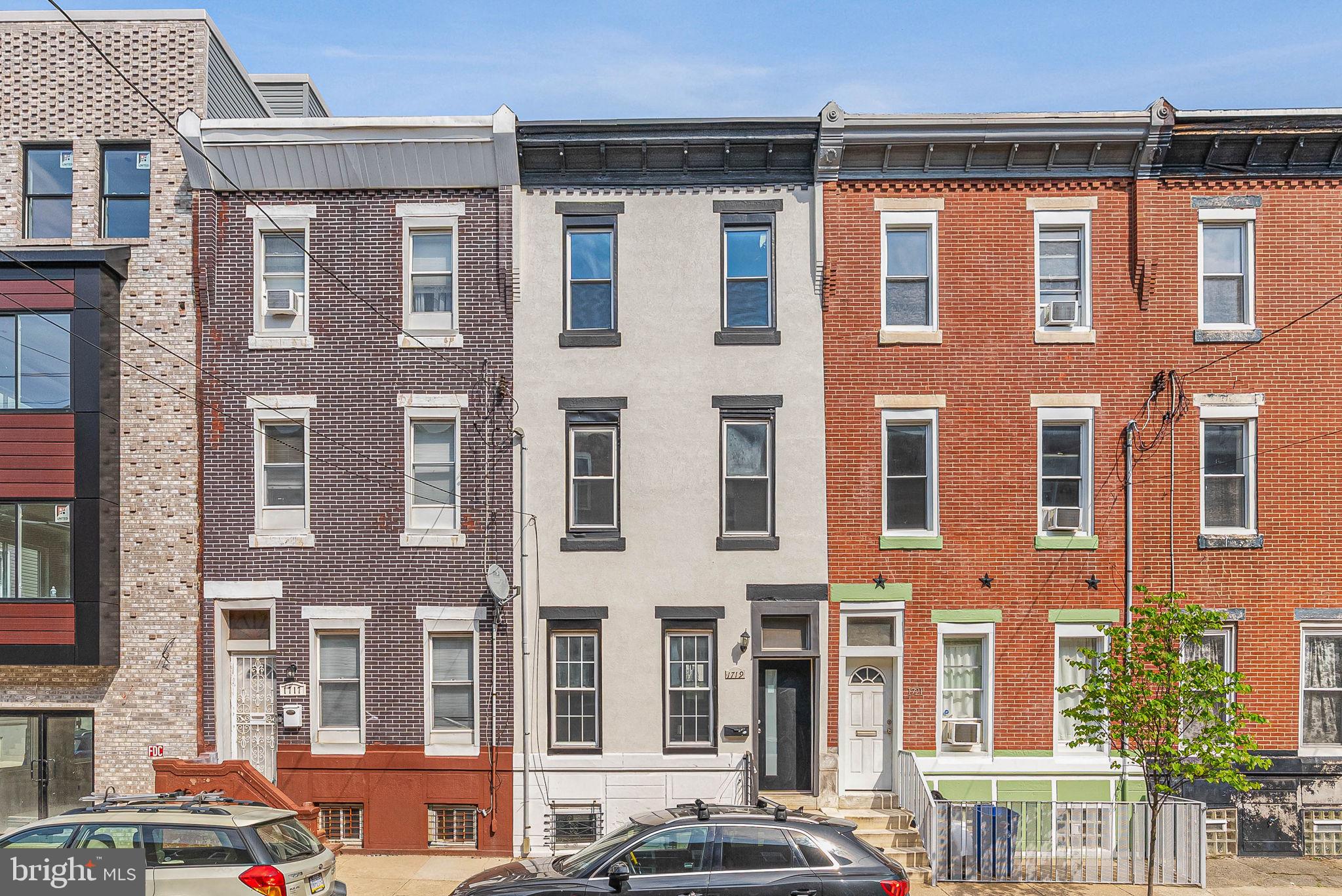 Welcome to 1719 S 18th St, a spacious 4-story home in Point Breeze offering 4 bedrooms, 2.5 bathrooms, 1,776 total square feet, multiple living areas, outdoor space, and a private roof deck with wide city views.

Step inside to a bright, open living room with hardwood floors, recessed lighting, high ceilings, and great natural light. The main level flows into a clean, modern kitchen featuring white cabinetry, granite countertops, stainless steel appliances, a gas range, subway-style backsplash, and a convenient breakfast bar area. Just off the kitchen, you’ll find access to the rear patio, offering a private outdoor space for grilling, entertaining, or relaxing.

Some photos have been AI enhanced. 
The finished basement adds valuable bonus space and includes a laundry area with washer and dryer. Whether you need a second living room, home office, gym, playroom, or extra storage, this level gives you the flexibility most city homes wish they had.

Upstairs, the home continues with generously sized bedrooms, hardwood floors, good closet space, and plenty of natural light throughout. The bathrooms feature green tile accents, modern vanities, glass shower doors, and a tub, giving the home a comfortable and practical setup across all levels.

The top floor features an additional bedroom and full bathroom, leading to the private roof deck with open skyline views. It is the perfect place to unwind, host friends, or enjoy a quiet morning coffee above the neighborhood.

Located in Point Breeze, this home offers easy access to local cafes, restaurants, parks, grocery options, public transportation, Broad Street, Passyunk Square, Center City, and major commuter routes. With 4 bedrooms, 2.5 bathrooms, a finished basement, rear patio, and roof deck, 1719 S 18th St delivers the space, layout, and outdoor living that make city living feel easy.