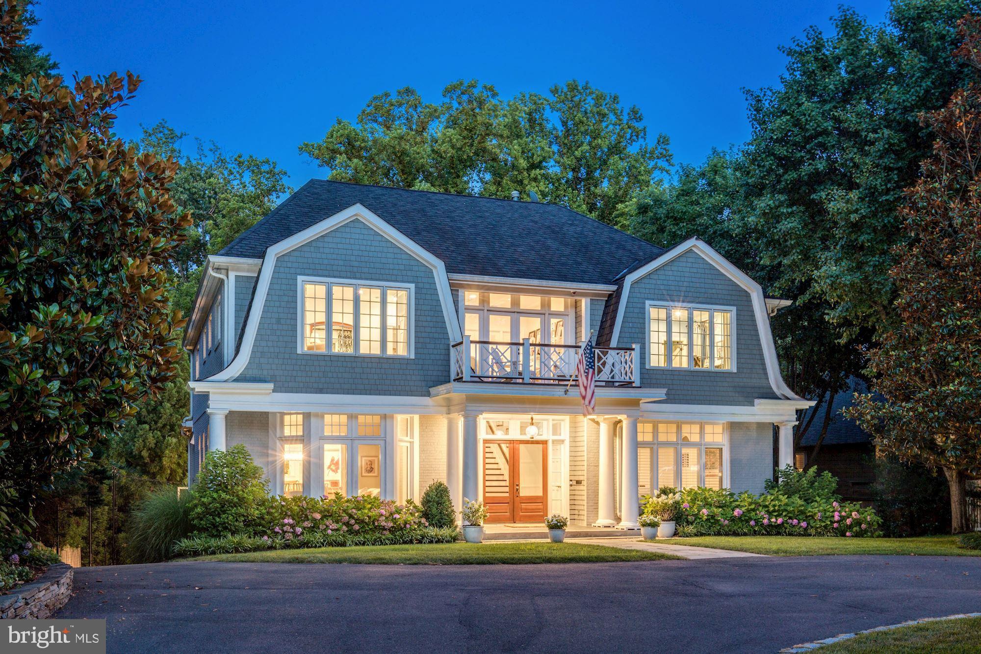 Located in beautiful Franklin Park, known for its winding wooded lanes and charming properties, this exceptional residence features iconic Nantucket style architecture, impeccable craftsmanship and endless options for indoor/outdoor living. The charming shingle style design is enhanced by stone walls and well planned gardens which line the circular drive and front lawn. This residence offers elegant formal living and dining rooms, a truly gourmet kitchen with separate butler's pantry, spacious informal dining areas, two family rooms, 6 bedrooms with ensuite baths, two libraries, a gym, rec room and bar, and is set on a .57 acre lot with terraced landscaping leading to a flat rear yard. The home underwent an extensive expansion and complete renovation in 2013, adding approximately 2,300 sf of living space and 600 sf of Brazilian walnut terraces.



Upon entry are high bearing ceilings that stretch to the second floor upper gallery. Stained hardwoods, transitional millwork, coffered ceilings and V groove paneling anchor the space, smoothly flowing from formal areas into the kitchen and family room, fully embracing the potential that the natural light brings. The kitchen is timeless with classic white inset cabinetry, marble countertops, apron sink, oversized island with built in microwave and warming drawer, designer lighting, a full-size sub-zero refrigerator, full size subzero freezer and a Wolf 48" double range. Continuing to the rear patios is a sunroom/library with custom built-ins and a 13' 7.5" wall to wall window overlooking the rear yard. Other features include a custom Pantry/laundry Room with ladder, French doors, living and family room fireplaces as well as custom wood working, built-ins and window seats.



Walking upstairs the abundance of natural light is featured again, especially from the airway library at the top of the stairs with adjacent front-facing deck. The primary bedroom has cathedral wood-beamed ceilings features an incredible rear balcony with fireplace and television. Included is a hidden built-in breakfast bar with wine fridge, ice maker, dishwasher and microwave, an interior fireplace with 2021 new marble surround, a custom closet, a luxuriant full bath with a deep soaking large whirlpool tub, along with a steam shower and bidet system. Bedrooms feature designer wall coverings and continue the theme of sleek natural material tile and finishes.



The lower level has everything needed and more, including both a single and double car garage, gym, a guest bedroom with a closet and full bath, mudroom, powder room, recreation room and a custom-built bar with a dishwasher, sink, 2 refrigerator drawers and an ice-maker. Wood beams line the ceiling in tandem with walnut hardwood flooring throughout. A rear sport court, three-zone irrigation system, exterior lighting, sonos sound system, nest thermostats and generator complete the amenities.



In quiet repose or engaged in social enjoyment, 1933 Rockingham provides the ideal setting for whatever captures the imagination. Sited beautifully in the sought-after community of Franklin Park, known for its lush natural landscape, mature trees, and charming rolling hills, this home offers access to the best of McLean with its close proximity to all that Downtown McLean has to offer, and is also ideally situated just minutes to the George Washington Parkway, 1-66, Tyson’s Corner, and the Capitol Beltway.