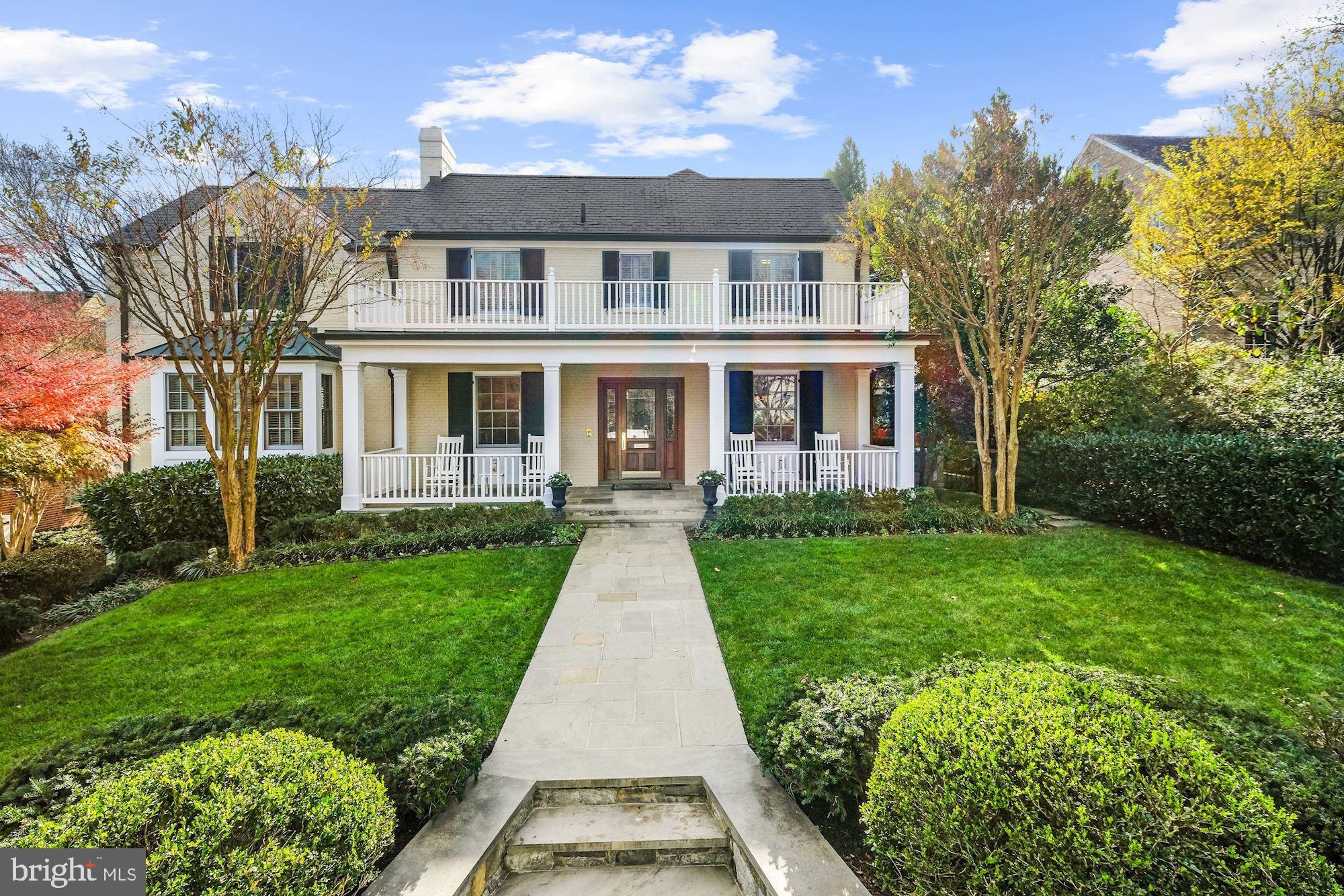 4914 Upton Street NW is a timeless 5 Bedroom and 4.5 Bath Colonial that was beautifully renovated and seamlessly expanded in partnership with Jim Gibson Builders and GTM Architects. Spanning approximately 5,400 SF and perfectly situated on an expansive 1/4 acre lot in Spring Valley, this lovely residence showcases a backyard oasis that includes two patios, a rear deck, and a level green space. Gleaming hardwoods, Niermann Weeks lighting, luxurious plantation shutters, custom millwork, Gourmet Kitchen, Family Room and Breakfast Room with Southern Exposure and walkout to Deck. Primary Bedroom showcases a soaring vaulted ceiling, a fireplace, walk-in closet, and Bath with soaking tub and heated floors.  2nd level has an Office/Sitting room and a separate laundry room. Lower Level with Recreation Room, 450-bottle climate-controlled glass-front wine room, a second Full Kitchen with a wine refrigerator, an Office Space with built-in desks, an Exercise Room/5th Bedroom, and Full Bath. Attached and heated 2-Car Garage is complete with a custom enamel finished concrete floor, additional covered parking for two.