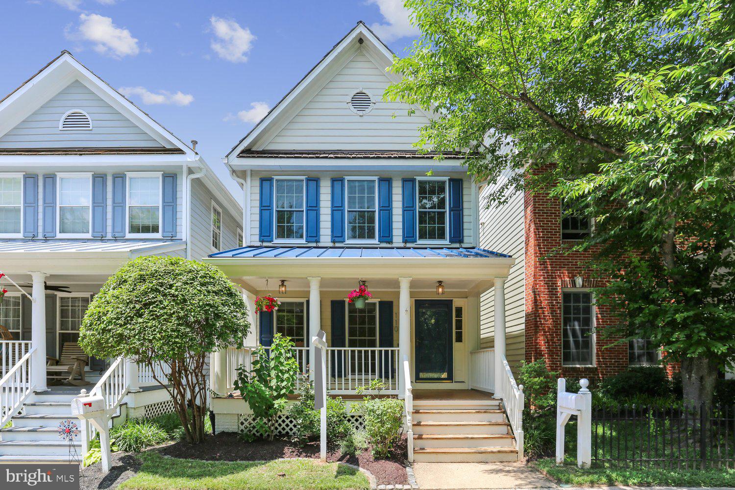 The picturesque front porch provides a welcoming introduction to this beautifully updated home. Hardwood floors flow from the entry foyer into the spacious, light-filled living room. The updated kitchen features granite countertops, white cabinetry, stainless steel appliances, a breakfast bar, and adjoins the spacious breakfast room. The versatile family room provides access to the large, level, fully fenced backyard and patio, creating an ideal setting for relaxing, playing, and entertaining. An updated powder room with granite countertops and decorator lighting and fixtures, and a roomy coat closet completes the main level. 

Hardwood flooring continues up the staircase and upper-level landing, accented by decorator lighting. The primary suite is filled with natural light and features a lighted ceiling fan, a large walk-in closet with a custom organizer system and a window, and spa-like en-suite bath updated to include granite countertops, dual sinks, a tub/shower, and decorator lighting and fixtures. The expansive second bedroom and big third bedroom each include roomy closets while the beautifully updated second full bath features a furniture-grade vanity, updated hardware, lighting, mirror, and a tub/shower. This level also includes a large storage closet. 

The finished lower level provides outstanding additional living space with a large recreation room featuring neutral carpeting, recessed lighting, and daylight windows. The laundry area includes a double utility sink, extra cabinetry, updated washer and dryer, and abundant storage space. A third full bath with a glass-enclosed shower adds convenience and flexibility.  

Ideally situated near Kentlands lakes and walking paths, this home offers close proximity to the community’s countless shops, restaurants, parks, and amenities, as well as easy access to major commuter routes.