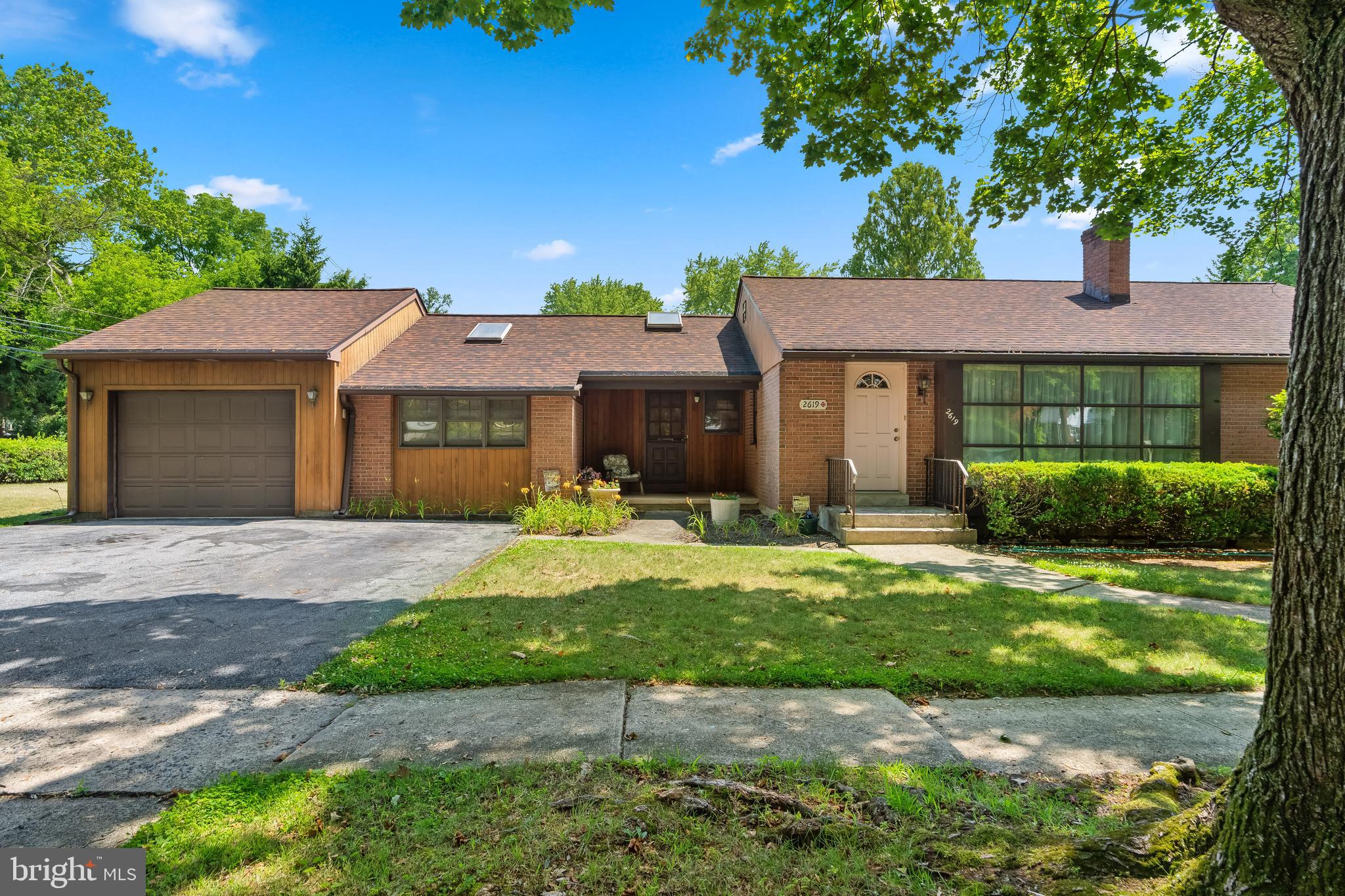 Sprawling Brick Ranch Home situated on a tree-lined corner lot in desirable West End Allentown. This well-maintained home features a large modern eat-in kitchen with maple cabinets, center island, skylights, and an abundance of counter space and cabinetry — perfect for someone who loves to cook and entertain. The spacious living room offers large floor to ceiling windows that fills the home with natural light, along with a cozy wood-burning fireplace. The primary bedroom is generously sized with plenty of room for a king-size bed, dressers, and features double closets. Hardwood floors run throughout the first floor. Major updates include a new roof and central air conditioning installed in August 2018. The home offers three heating zones for added comfort and efficiency (first floor, lower-level family room, and rear addition). The third bedroom is currently being used as a home office. A huge rear addition provides an expansive family room and dining area, making it ideal for entertaining and gatherings. Conveniently located just minutes from shopping, schools, parks, restaurants, and major routes. This home offers easy single-story living with a highly functional layout designed for both everyday comfort and entertaining. This isn’t just a house — it’s a lifestyle upgrade you don’t want to miss!