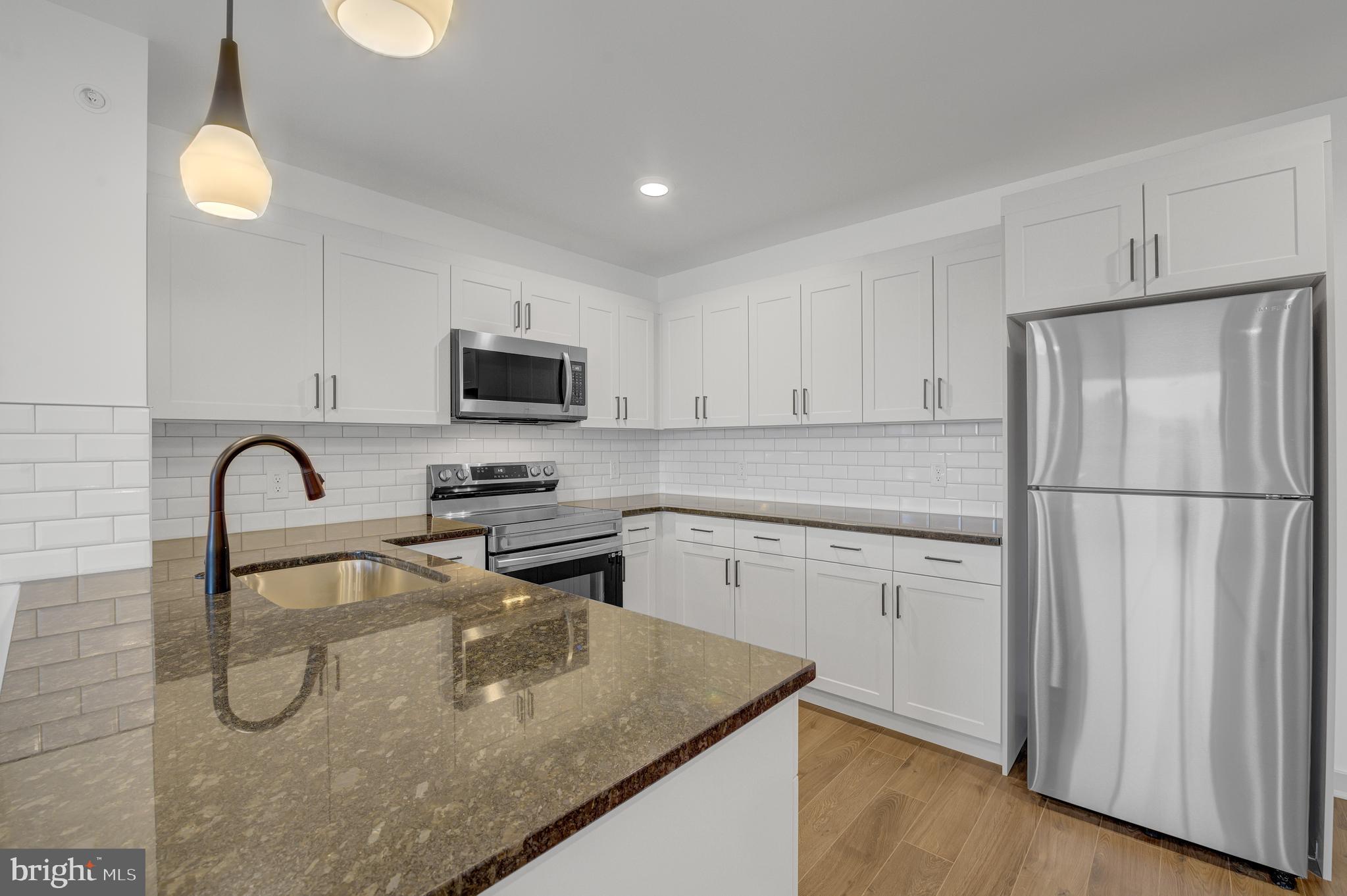 Available July 1st! Spacious and modern two-bedroom becoming available at The Riley! - Unparalleled Living in Roxborough- Manayunk. Brand-new construction! This residence offers a range of meticulously designed studio and one to two-bedroom apartments, each boasting modern aesthetics and premium features. Located on the vibrant Ridge Avenue corridor, this brand new community  is convenient to an eclectic mix of dining, shopping, and entertainment options right at your doorstep. Apartment Features include  Oversized Windows for Abundant natural light, Wood-Inspired Flooring: Elegant and durable for easy maintenance,  PTAC Climate Control in each room -  Personalized temperature control for your comfort., Washer/Dryer in each home - plus Custom Granite Countertops and Island Kitchens: Perfect for culinary enthusiasts and entertaining. The Riley is 100% pet-friendly with no additional fees! Apply Today!