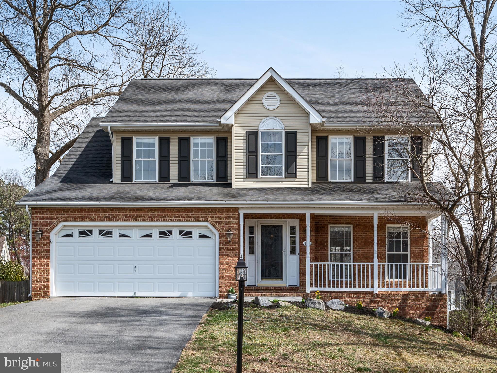 This gorgeous 3123 finished square foot colonial is situated in the desirable Pioneer Heights neighborhood, nestled on a quiet cul-de-sac on the east side of Winchester. With a prime commuter location just minutes from Route 7,  you'll enjoy both convenience and tranquility. As you step inside, you're greeted by beautiful hardwood floors that flow through the main level living areas, complemented by updated flooring in the kitchen. The vaulted ceilings and expansive windows create an open, airy atmosphere, making the first floor feel inviting and spacious. The upper level features four generously sized bedrooms, including a luxurious primary suite with a walk-in closet. The en suite bathroom boasts new flooring and a stunning jetted tub with a stone surround. The additional three bedrooms are accompanied by an upper-level laundry room and a hall bath, overlooking the elegant two-story foyer.
Step outside to your private retreat—the spacious rear covered deck is perfect for outdoor dining and relaxing. The huge, fenced-in yard offers an ideal space for pets to roam freely, as well as plenty of room for gardening and outdoor activities. The finished basement adds to the home's appeal, featuring a large recreation room perfect for entertaining. It includes a fifth bedroom with a full bath, making it a great space for guests or as a private suite. Additional storage areas, complete with a work table and extra closets, ensure you have all the space you need. This home combines comfort and style with important updates, including a new roof and water heater—both just two years old. The freshly painted interior and exterior deck complete the package, making this home truly move-in ready.