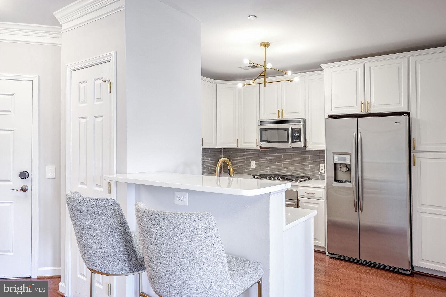 Beautifully renovated and upgraded 2 bedroom, 2 full bathroom condo with private balcony and community terrace all perfectly located in downtown Cherrydale.  Walk to Safeway, Dunkin' Doughnuts, Cherrydale Hardware, parks, trails, shops, gyms and restaurants.  Approximately 1 mile from the Virginia Square and Clarendon Metro stations.  One underground and assigned parking space included and one additional available for an additional $125/month.  Available to begin a lease in May 1st 2025.  Please use RentSpree link here to include income verification (total fee of $49.99) for all applicants:  https://apply.link/5O1FSlw