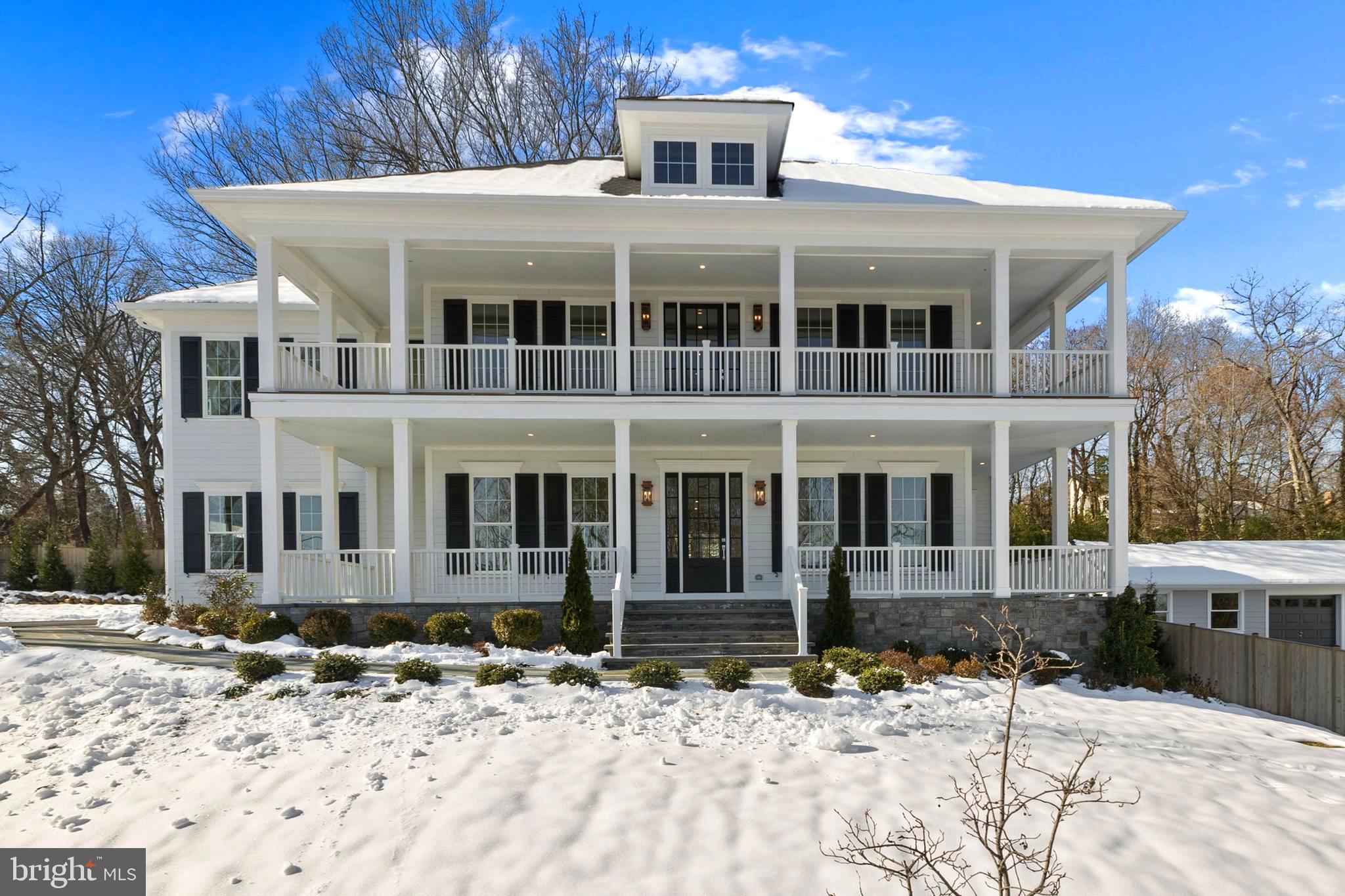 Welcome to this newly constructed masterpiece, where timeless Southern charm meets modern luxury! Boasting a signature double front porch, this home is thoughtfully designed to capture breathtaking views of the Potomac River, offering a serene and sophisticated retreat. The interior showcases an impressive open floor plan, perfect for both entertaining and everyday living. Soaring 10-foot ceilings on the main level and 9-foot ceilings on the upper and lower levels enhance the sense of space and grandeur. 7 1/2 inch white oak hardwood floors grace the main and upper levels, while durable and stylish LVP flooring completes the basement. At the heart of the home is a custom St. Clair kitchen, a chef’s dream with inset cabinetry, 36 inch range, 42 inch fridge, Carrara quartz countertops, custom range hood, and marble backsplash that blend beauty and functionality. 5 spacious bedrooms each with en-suite bath and exceptional attention to detail throughout.  Details including 5 1/2 inch casing,  9 inch baseboards, 10 inch cove style crown molding, and solid core doors.  The floor plan is well thought out positioning gracious views from the office, dining room, primary bedroom, and 2 of the 3 upstairs guest suites.  Nestled just beyond the picturesque stone bridge on the east side of the GW Parkway, this one-of-a-kind property boasts an unbeatable location. Perfectly positioned along the scenic walking trail, it offers tranquil surroundings while being just minutes away from historic Old Town Alexandria, local shopping and grocery, and just 8 miles to National Airport.  Whether you’re hosting gatherings or enjoying quiet mornings on the porch, this home provides the perfect balance of elegance and comfort.  This home is the epitome of modern Southern living!  Open Sunday 1/26 from 12-2pm