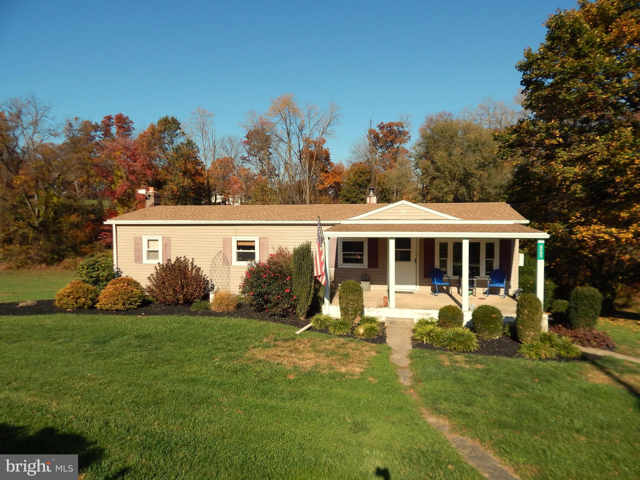 Country home sitting on just under 2 acres. Quiet road. Peaceful setting. Occasional visits from deer in the backyard. Plenty of room to sprawl out and relax. Finished basement, new roof, Laminate flooring throughout. Washer, dryer, and coal stove included. Pool table is negotiable. Take a ride through the country and have a look at this one!