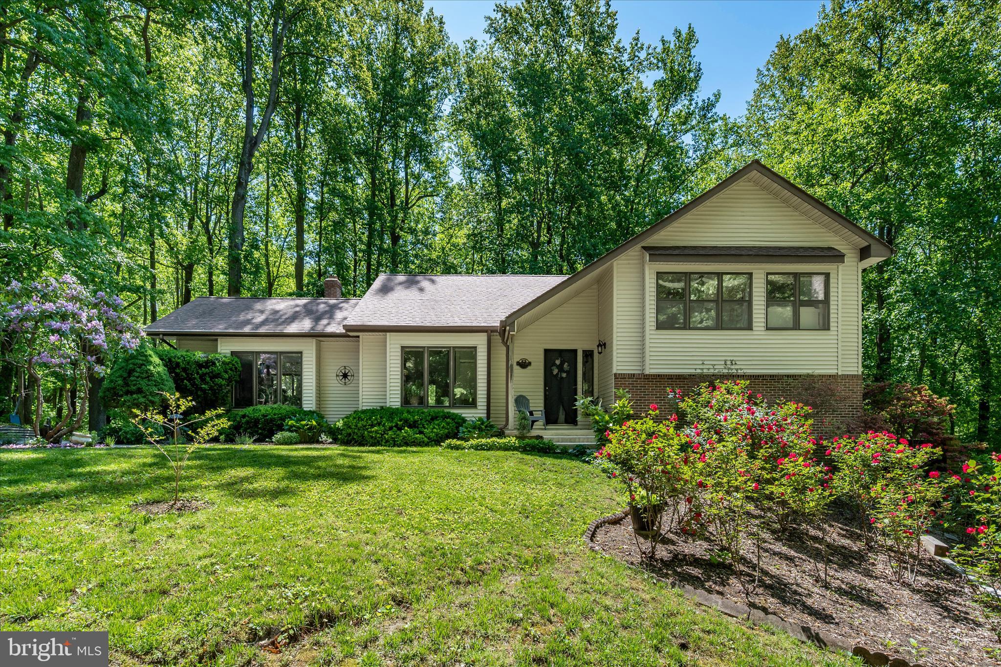 $$10,000$$ SELLER CREDIT!! For those seeking privacy and tranquility, this residence presents an ideal opportunity. 🏡🌳 Meticulously maintained and upgraded. ✨ Upon entering, one is immediately impressed by the inherent elegance of the property. 🤩 Spanning over 2,600 square feet, this home features four bedrooms and three and a half bathrooms. 🛌🛁 The main level showcases a beautifully appointed kitchen with granite countertops and custom cabinetry, a living room seamlessly integrated with the dining area, and a convenient half bath. 🍽️🛋️ The expansive family room includes a wood-burning fireplace and provides access to one of the property's multiple decks. 🔥🏞️ The upper level comprises three bedrooms and two full bathrooms, with the primary bathroom recently updated with exquisite tile work. 🚿💎
Proceed to the lower level to discover a comprehensive suite of amenities, including a full kitchen, family room, dining area, bedroom, office, and full bathroom. 🧑‍🍳🛋️ Furthermore, the property extends beyond the interior, offering a remarkable exterior landscape. 🌳🌸 This expansive 3-acre property ensures both privacy and serenity. 🏞️🧘 Envision hosting events by the pristine pool or simply relaxing on the deck. 🏊‍♀️☀️ The location provides convenient access to local attractions such as the boardwalk, water park, beaches, dining establishments, and retail outlets. 🎡🎢 Given the anticipated demand, we encourage you to schedule a showing promptly. 🗓️📞 Agents are advised that the access road is a shared right-of-way among three neighboring properties. 🏘️🤝