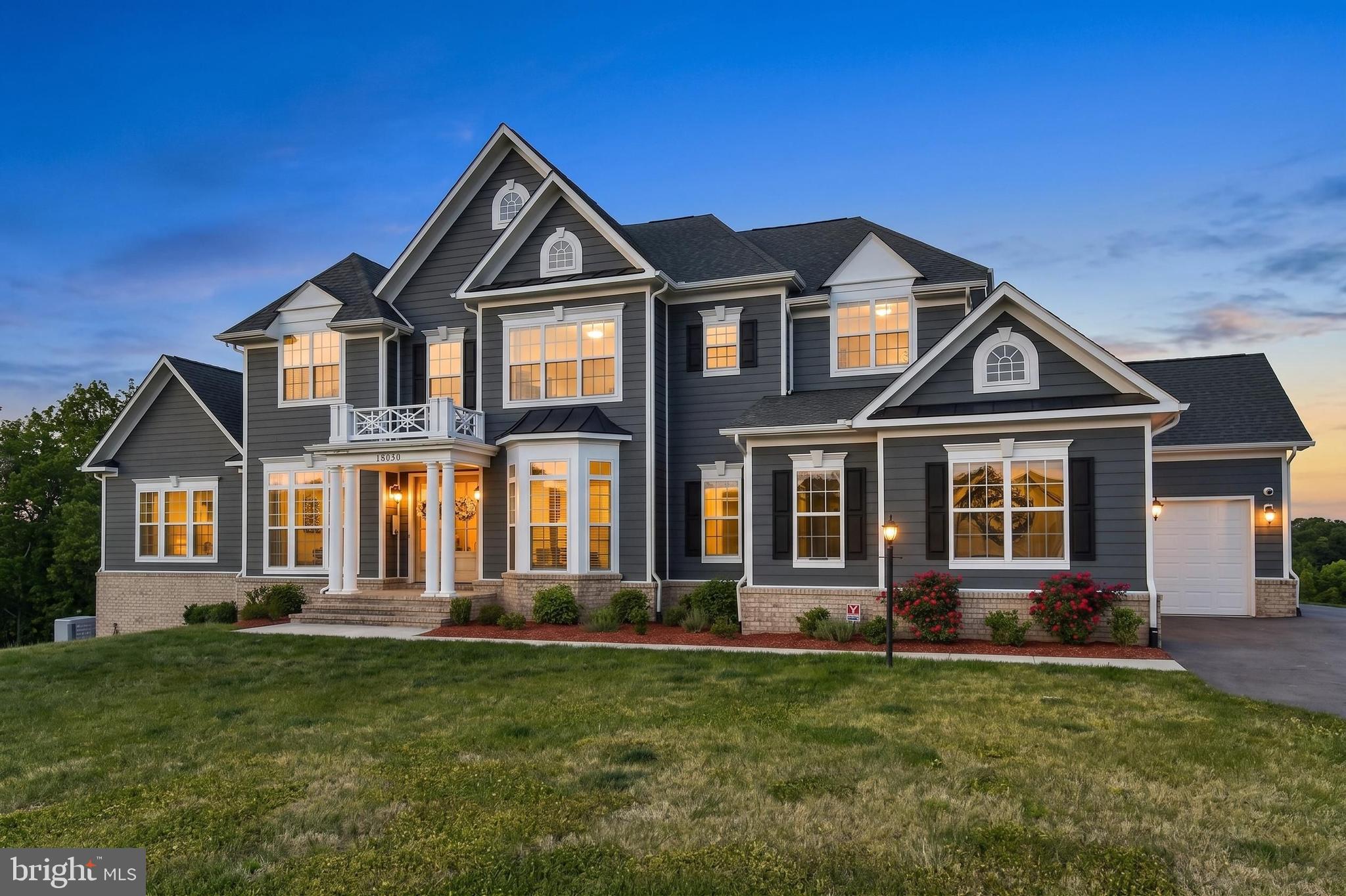 Crafted by renowned Carrington Homes, this exceptional Glen Springs model offers the perfect blend of custom-level craftsmanship, modern luxury, and an unbeatable Loudoun County lifestyle—all without the wait of new construction.

Perched on a picturesque 1.5-acre homesite with sweeping sunrise views overlooking Leesburg, this nearly 7,700-square-foot estate offers 7 bedrooms, 7 bathrooms, and three fully finished levels designed for elevated everyday living.

Located just 8 minutes from historic downtown Leesburg and King Street, Main Tree Farm delivers a rare combination of peaceful Western Loudoun scenery and immediate access to one of Northern Virginia’s most vibrant destinations. Spend your mornings biking the nearby Washington and Old Dominion Trail, grabbing coffee along Leesburg’s renowned “Coffee Corridor,” or enjoying brunch, wineries, breweries, and nightlife just minutes from home.  

Inside, the thoughtfully designed floor plan includes a desirable main-level guest suite, ideal for multigenerational living or extended stays. Architectural details elevate the home throughout, including double mahogany front doors, a grand oak staircase, a beamed kitchen ceiling, and a dramatic coffered ceiling in the family room.

The gourmet kitchen seamlessly connects to the spacious family room and outdoor living spaces, creating an ideal layout for entertaining and everyday comfort. A large Trex deck overlooks the scenic landscape, while the fully finished walkout basement offers exceptional flexibility for recreation, guests, fitness, or additional gathering spaces.

Exterior features include HardiePlank siding, a striking stone watertable with flagstone steps, and a three-car garage—all reflecting the timeless quality and craftsmanship Carrington Homes is known for.

Main Tree Farm represents a rare opportunity to enjoy luxury living with privacy, panoramic beauty, and immediate access to the restaurants, boutiques, coffee shops, entertainment, and historic charm of downtown Leesburg.