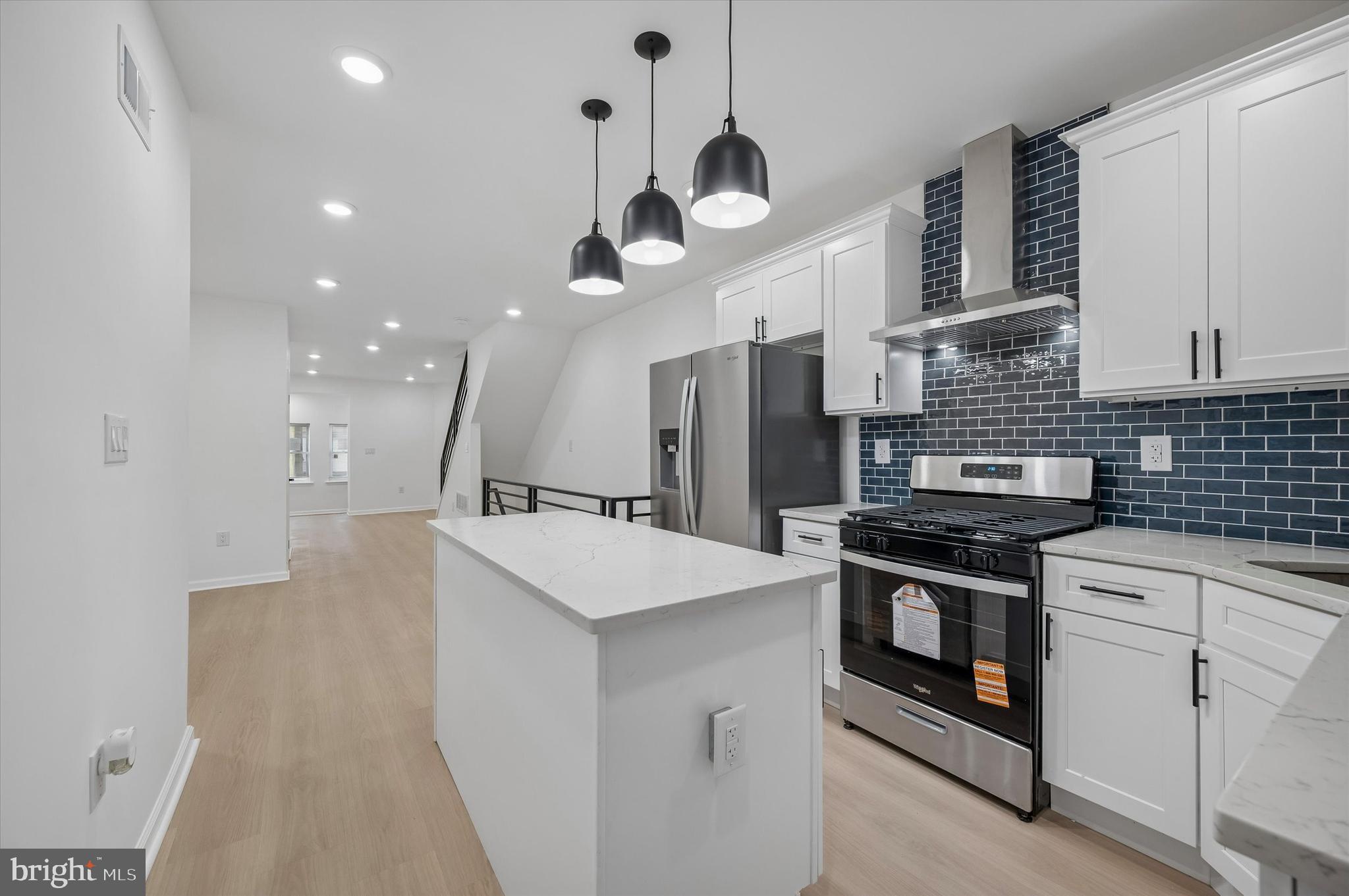 Welcome to 5539 Pine Street, a beautifully renovated move in ready home in the heart of Cobbs Creek and West Philadelphia. This 3 bedroom, 2.5 bathroom home offers modern upgrades, an open floor plan, and stylish finishes throughout, perfect for today’s homebuyers seeking convenience, space, and value.
Step inside to a bright and airy living and dining area filled with natural light, featuring recessed lighting, modern railings, and updated flooring. The gourmet kitchen is a standout, complete with stainless steel appliances, quartz style countertops, sleek cabinetry, and a large island ideal for entertaining, meal prep, and everyday living.

Upstairs, you will find three spacious bedrooms with great closet space, along with beautifully updated bathrooms on every level. Each floor includes a bathroom, offering added functionality and convenience for families or guests.

The finished basement provides additional living space perfect for a home office, gym, media room, or guest area, with easy interior access for storage and flexibility.

Outdoor features include a large fenced in backyard, perfect for entertaining, cookouts, pets, or relaxing outdoors, as well as a fully concrete low maintenance front patio that is also fenced for added privacy.

Additional highlights include central air, updated systems, modern finishes, and turnkey condition, making this home ideal for first time homebuyers, investors, or anyone looking for a renovated Philadelphia home.

Located in the growing Cobbs Creek neighborhood, this home offers close proximity to Baltimore Avenue, University City, Center City Philadelphia, University of Pennsylvania, Drexel University, public transportation, parks, trails, shopping, and local community services, including a nearby police station, offering added convenience and peace of mind.

A great opportunity to own a fully renovated home in West Philadelphia with strong growth potential. Schedule your showing today.