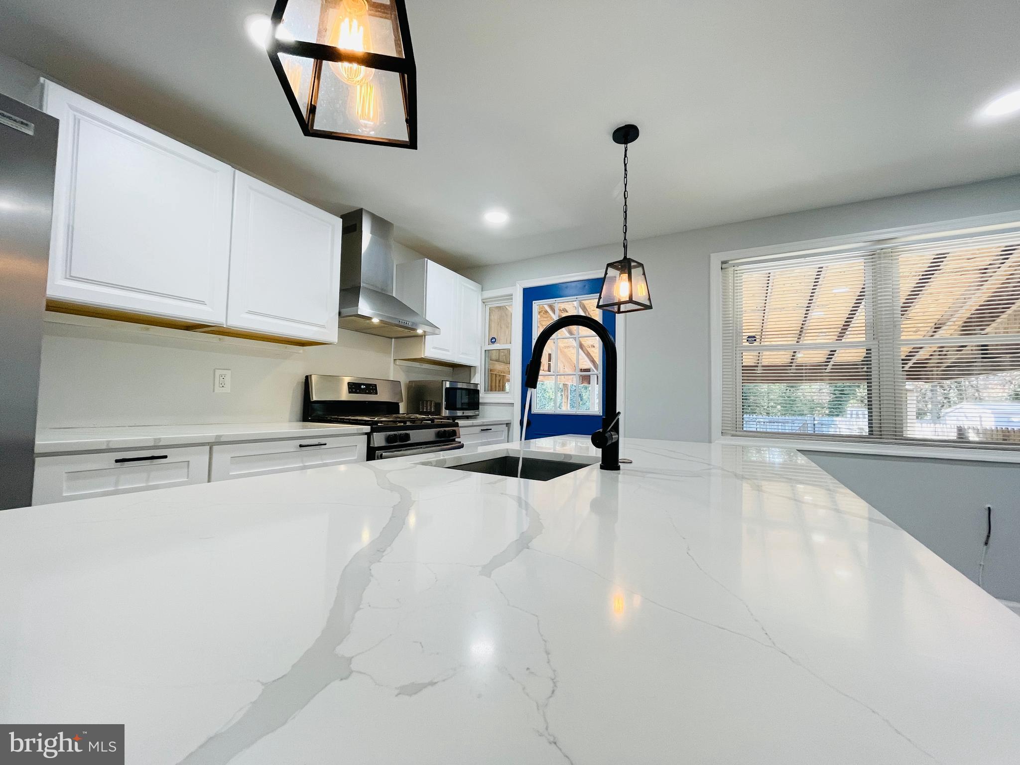 *** This STUNNING BRIGHT & SPACIOUS 1536 sq ft 3BD/2BA + FAM RM with Private Parking WOWS with its modern spacious open layout including LUXURY VINYL PLANK FLOORING throughout * RECESSED LIGHTING * GOURMET KITCHEN &  DINING AREA … MASSIVE KITCHEN ISLAND (great for family & friends gathering around, perfect to prep & serve!) w/Sink, Beautiful Pendant Lighting, Breakfast Bar, D/W, Under-Island Storage …Quartz counters,  Soft-close Cabinetry … Stainless Steel Appliances (Refrigerator, Gas Stove w/Chef-Style Hood Vent, Microwave) *** UPPER LEVEL provides 3 BEDROOMS * GENEROUS GORGEOUS Upper Bathroom w/ Tub & Marble-Style Tiled Surround *** LOWER LEVEL includes FAMILY RM which could serve as Den, Office, or 4th BD * BEAUTIFUL MODERN FULL BATH with HUGE OPEN WALK-IN TILED SHOWER * Laundry & Utility Room * Entrance to Rear Yard *  Home also includes a  Roof-Covered Front Sitting Porch * Roof-Covered Rear Patio * NEW Vinyl Fencing & Gate to Private Parking Space *** ONLY MINUTES FROM NORTH POINT STATE PARK (with hiking & biking trails, fishing pier, picnic pavilions, swimming, plus more!). ACCEPTING CURRENT ZILLOW APPLICATIONS ... * Utilities (water, BGE): paid by Tenant * Grounds, mowing, weeding, snow/ice removal: cared for by Tenant. * No Pets.  * No Smoking in house.  * $1900 security deposit to be paid upon applicant approval. * $1900 first month's rent to be paid prior to move-in.   * 1 year lease * PROPERTY HAS BEEN CERTIFIED LEAD-FREE.
*************************************************************************************************************IMPORTANT: PLEASE SEE THAT YOU MEET ALL RENTING CRITERIA  (see documents) BEFORE APPLYING!  * Minimum 600 credit score required.  * No bankruptcy  * $5200/mo verifiable net monthly income).  * 2 years good comparable (similarly-priced) rental history required--no lates, no evictions, no court filings, no violations. * Able to verify/confirm tenancy with landlord(s)  * 1 Year or more in present job (if employed).  *  Must be MD resident for 5 years.  * See documents for further details.