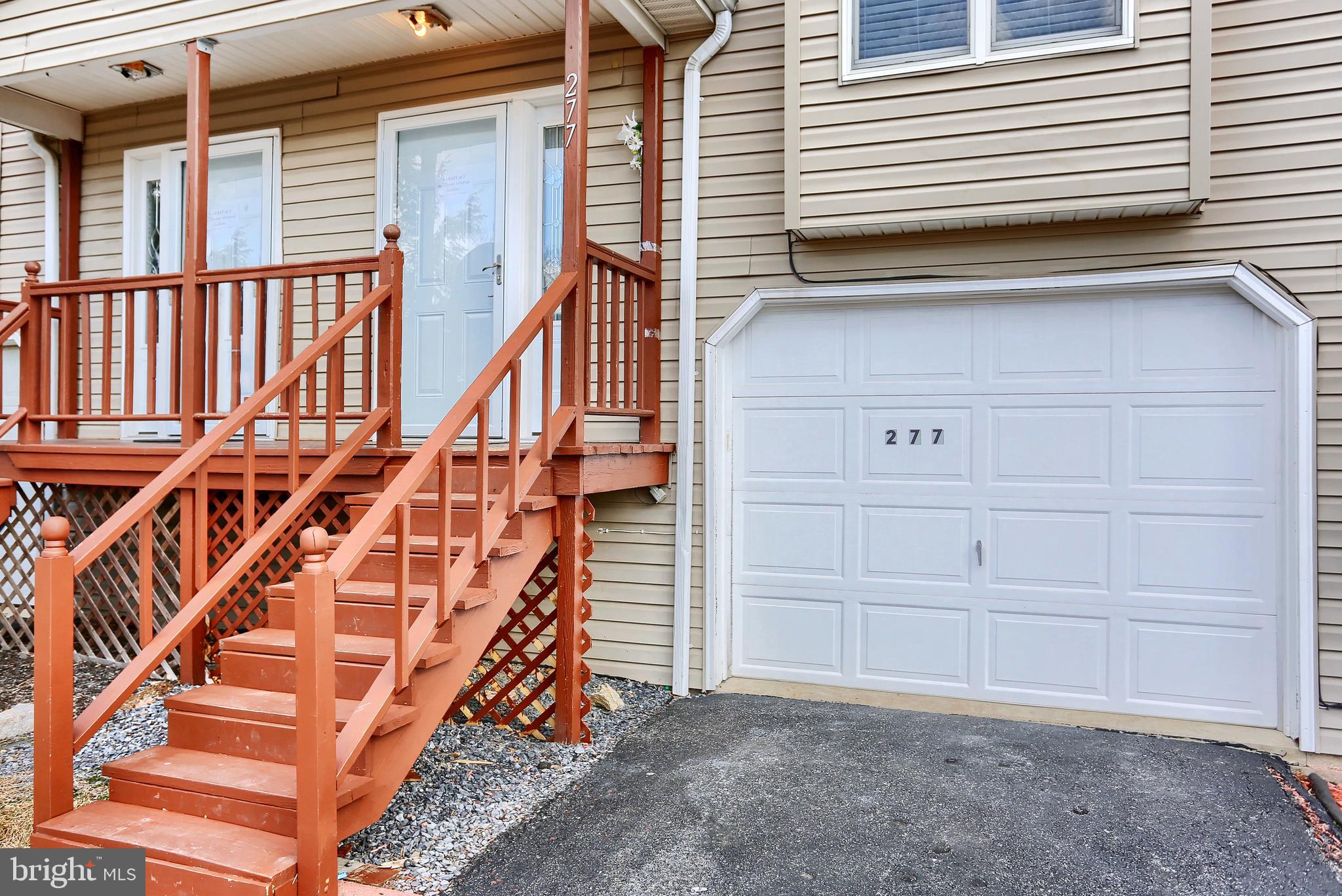 Your beautiful home awaits you! It includes a large living room, eat in kitchen, convenient main level powder room w/ new flooring. Brand NEW  Flooring  LR, stairs & all BRs installed 1/11/2021. Finished L/L with multiple uses and laundry.  A deck to entertain and enjoy as well as a generous yard.   Abundant parking along with an oversized garage.  NO HOA FEES! BARGAIN OF THE CENTURY. Sellers have their new home and want this SOLD SOLD SOLD! Call now for your private showing before it's GONE GONE GONE!!!