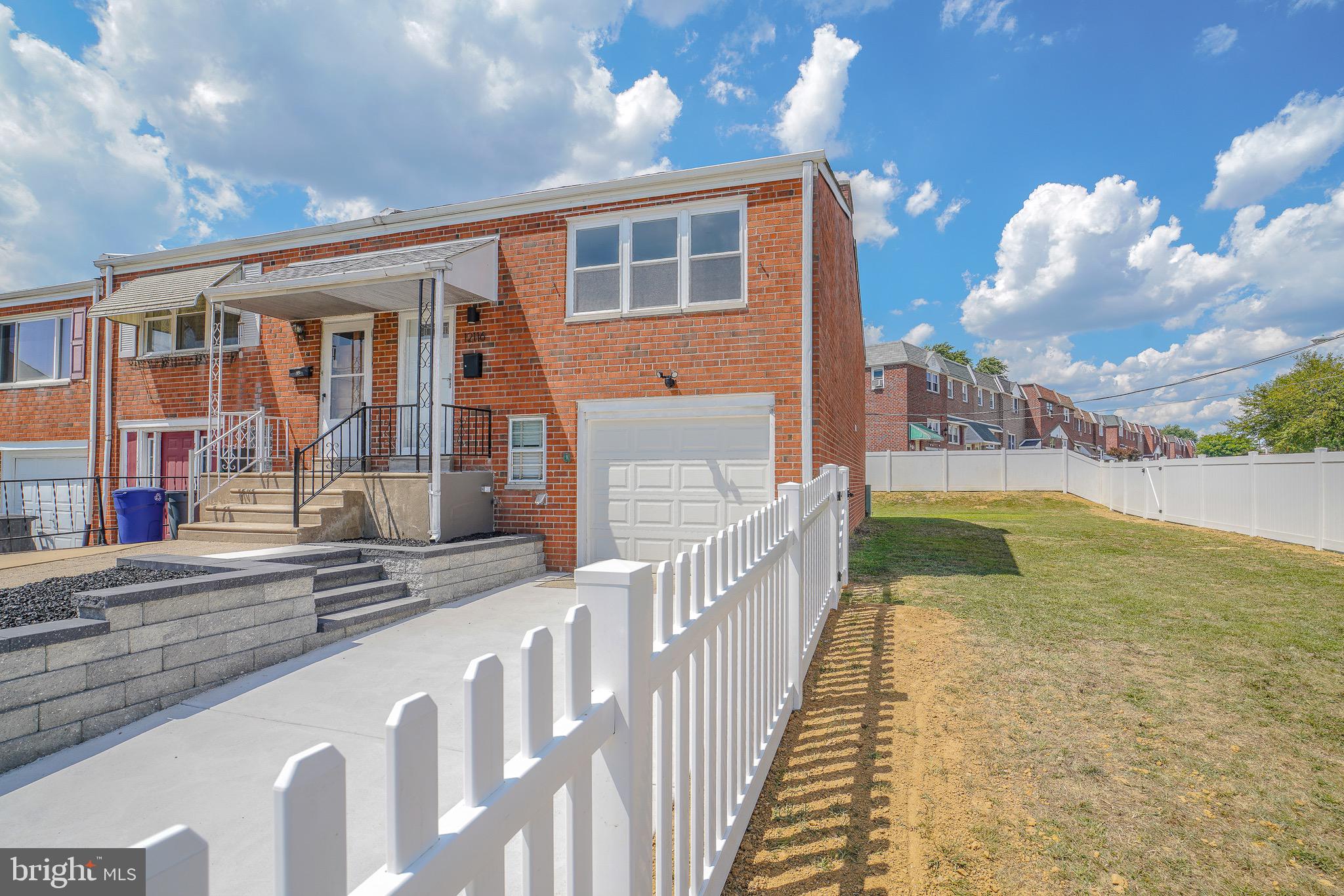 Welcome to 12116 Academy Road, A wonderfully renovated home in the Far Northeast! Located on the corner this fully redone home has a very large side yard perfect for any families needs. The vinyl fence is brand new and just installed prior to listing.  All new concrete was just poured on the exterior of the home including sidewalk and driveway! Exterior landscaping and new pavers complete the exterior renovations. 
Make your way inside this tastefully renovated home and you will notice the brand new hardwood floors as soon as you walk in the door. The kitchen has brand new white shaker cabinets that are perfectly complimented with granite countertops and tile backsplash. There are two large bedrooms and 1 full bathroom with all new shower doors, tile, vanity and mirror to finish the top floor. Downstairs you will find a large wide open finished room to add as living space. There is another bathroom next to the large living space.  There is a sliding door off of this room that allows you to head out to the huge yard. We welcome your visit!