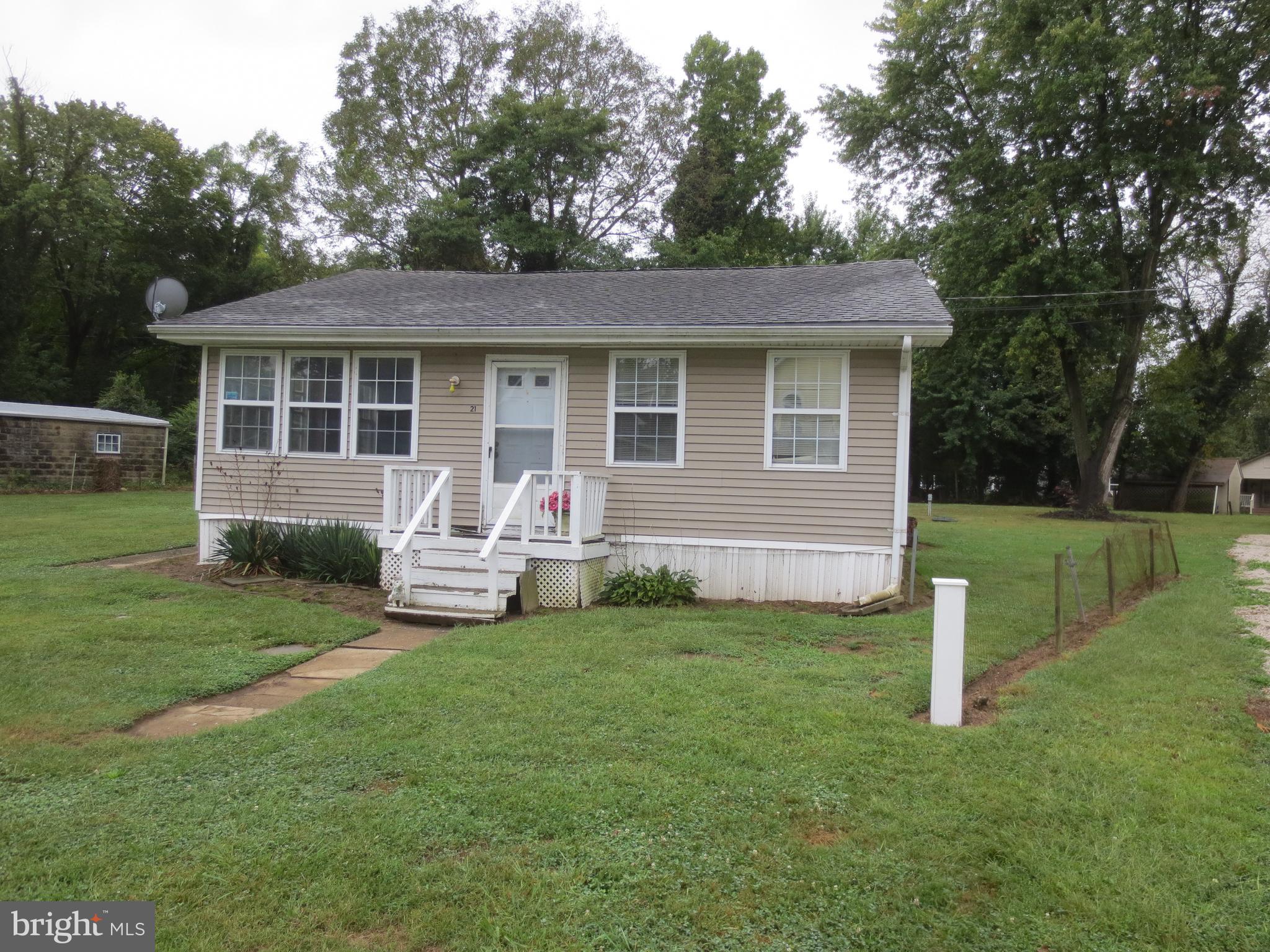 Hacks Point is easy access to rt 40, and 95 while allowing a boater's experience at an affordable price. This property is two lots adding up to over 19000 sq. ft. The property has a newer BAT septic system and older drilled well. The house has been stripped to the studs, there is some water view, and with some ingenuity in the remodel, more view can be had. There is a new perc towards the back corner of the property which may allow an ancillary dwelling to be built. Hacks Point offers two larger beaches and some smaller beaches for residents and guests. The 65-slip pier allows for varied sizes of boats and depths up to 8 feet MLW. The community park is for everyone to enjoy. Spring through fall there are boats in the water. Across the river is a worldclass winery and restaurant as well as a state park perfect for hiking and horse trails.