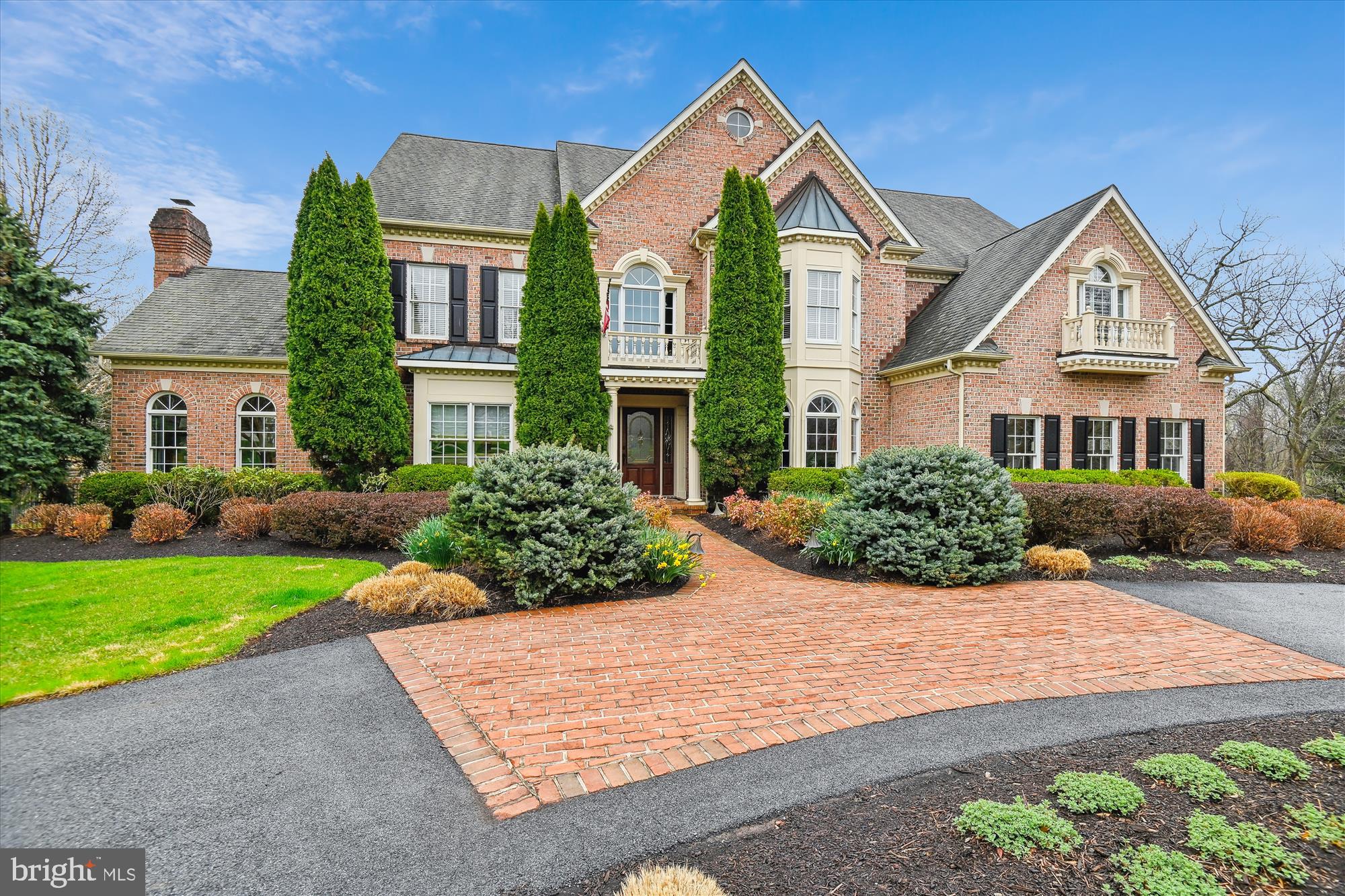 Welcome to this exceptional executive home by Custom Stapf Builders, offering 6 bedrooms, 4 full bathrooms, and 2 half bathrooms, all nestled on 1.24 “park-like” acres in the highly sought-after Braeside community. This remarkable residence has been meticulously cared for, showcasing an impeccable exterior that includes a strong structure, extensive hardscape, and beautiful mature landscaping, complemented by exquisite interiors designed with remarkable attention to detail.

Upon entry, you'll be welcomed by a stunning entrance hall adorned with beautiful hardwood flooring—consistent throughout the residence—and a soaring vaulted ceiling. To your right, the formal dining room features custom-designed drapery, while to your left, you'll find a warm and inviting library equipped with custom built-ins and Roman shades. Just beyond, the generously sized living room is awash with natural light and enriched by a cozy gas fireplace.

Continuing with the flow of the layout, you’ll discover a private office that leads to an impressive family room boasting a towering ceiling and another gas fireplace. Overlooking the family room is the heart of the home—a spacious eat-in custom kitchen that is bound to impress. Featuring a brand-new 8-burner Wolf Range, a brand new built-in Sub Zero refrigerator, two dishwashers, a wine refrigerator, a practical “trench” sink, custom countertops, tumbled marble flooring, and an inviting breakfast room, this kitchen truly has it all. The main level is also equipped with a Butler’s pantry featuring an additional wine refrigerator and sink, two powder rooms, a mud room, and a laundry room that is designed to impress.

Ascend the dual staircases to the second level, where you'll find the enviable Primary Suite. This private retreat features a tray ceiling, Roman “blackout” shades, a gas fireplace, a walk-in closet with built-ins from Chesapeake Closet Company, and a cozy sitting area. The luxurious en-suite bathroom offers a large shower, a double vanity, and elegant travertine marble tile. Additionally, there are three more bedrooms on this level; one includes its own en-suite bathroom with a tub and shower combination, while the other two share a “Jack & Jill” bathroom featuring a double vanity and shower.

The lower level, spanning approximately 1,800 sq ft., extends the high quality of materials and finishes found throughout the home. It includes a large recreation room, an additional family room, with another fireplace, a sitting room, and walk-in closet space all featuring LVT flooring and recessed lighting. There are also two more bedrooms, walk-in closets and a shared bathroom, in addition to a deluxe home gym, a wine storage nook, and a utility room that comes equipped with an additional washer and dryer.

From the rear French doors on the main level, step outside to find an “all season” sunroom that is heated and air-conditioned, featuring travertine flooring, recessed lighting, and a ceiling fan—perfect for entertaining. This space offers breathtaking views of the stunning rear oasis, which boasts multi-tiered Timber-Tech decking, a built-in gas fire pit, and a large saltwater pool encircled by a gorgeous terrace crafted from locally sourced Western Maryland Fieldstone.

This one of a kind property is equipped with 2 separate garages (a 2 car and a 1.5 car) Enjoy the quiet side of Baltimore County with the convenience of quick and easy access to the Falls Road Corridor. 

This home is more than just a dwelling; it's a carefully curated living experience that combines luxury, comfort, and style—an opportunity not to be missed. 

Welcome home!