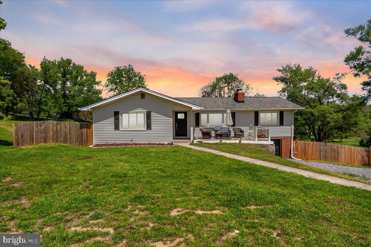 Take a look at this Beautiful Remodeled Home, situated in a country setting with pastoral views. No HOA or city taxes. Current homeowner has invested over $200,000 in recent upgrades in 2024/ 2025 which include: $25,000 in New Windows (except front bay window and basement) & Front door.  2 New FULL Baths, New Quartz Counter Tops & Kitchen Island, New Stainless-Steel Appliances, New Kitchen Foyer Flooring, New Carpet in Bedroom, All New Paint in Every Room, New Bedroom Doors & Bath Doors, New Trek Deck and Porch $27,000, New Radon Remediation System, New wood stove burning fireplace in basement 2025 $6,000. New Backyard Fence and Multiple Trees Removed $27,000, Gutters & Siding are 4 years old.  New private well, neutralizer, pressure tank & water softener over $11,000, Septic System with new backline.  New attic insulation $5,500, New French drain, foundation beams and sump pump $21,000. New garage door. New gravel driveway.  New electric panel. 5 min Drive to Downtown Mt. Airy with lots of local shops and dining.  Nearby are several Wineries (Black Ankle ,Linganore, & Elk Run) This home offers 1,602 sq ft of living space with another 1,602 below should you decided to finish the basement.  The lot size is 1.09 acres.  4.5 Miles to 70 W/E   Come and See today! HVAC system - Only AC works. There is some baseboard heating, fireplace and wood burning stove for heat.