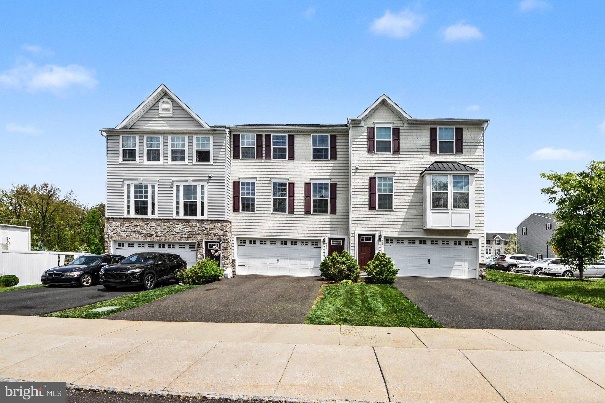 Welcome to 413 Arbor Blvd, a beautifully maintained townhome located in the desirable Perkasie Woods community, offering stylish finishes, thoughtful upgrades, and comfortable modern living throughout. This impressive home features 3 bedrooms, 3 full bathrooms, a 2-car garage, and an exceptional layout designed for both everyday living and entertaining.
The heart of the home is the stunning gourmet kitchen, complete with 42-inch cabinetry with crown molding, granite countertops, tile backsplash, an oversized 8-foot island, and an additional built-in hutch. Hardwood flooring throughout the kitchen and entryways adds warmth and elegance, while recessed lighting and modern fixtures create a polished, contemporary feel.
The spacious owner’s retreat offers a true escape with a tray ceiling, walk-in closet, and luxurious en-suite bath featuring a dual vanity, a soaking tub, and oversized shower. The finished walk-out basement adds valuable flexible living space perfect for entertaining, relaxing, or creating a home office, fitness area, or media room.
Outdoor living is just as inviting with a large 10x20 composite deck complete with a gas line hookup available for grilling, making gatherings and summer evenings effortless. Additional highlights include a Nest thermostat and MyQ garage connectivity for added convenience and energy efficiency, plus a gas connection behind the oven allowing future conversion back to a gas stove if desired.
Perkasie Woods offers a community playground while also being a prime location directly across from Lenape Park and all it has to offer! Enjoy nearby walking trails, parks, local restaurants, breweries, boutiques, and community events in charming downtown Perkasie and neighboring Sellersville. Convenient access to Route 309, Route 113, and the PA Turnpike makes commuting simple while still enjoying the character and atmosphere of Bucks County living.