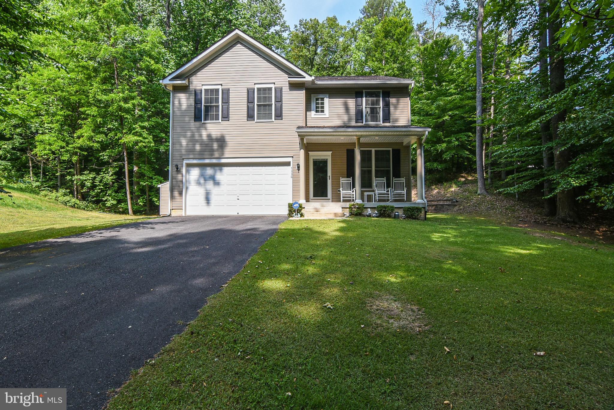 Welcome to 7336 Columbia Dr, King George, VA! 

This beautifully maintained 4-bedroom, 2.5-bathroom home, built in 2013, is located in the highly sought-after Presidential Lakes community. Offering 2,200 sq ft of living space, this home is perfect for families. The main level features gleaming hardwood floors, a spacious kitchen with granite countertops, and ample room for a dining table. The open layout flows seamlessly into the living area, providing an ideal space for entertaining.

Upstairs, you'll find plush carpeting throughout, and the large bedrooms provide comfort and space for everyone. The unfinished walk-out basement offers endless potential for future expansion.

Enjoy privacy and peacefulness with a backyard that backs up to the woods, plus plenty of space for outdoor activities. The deck is perfect for relaxing or hosting family gatherings, and the additional shed provides extra storage space.

The Presidential Lakes community offers a wealth of amenities, including basketball courts, swimming pools, lakes, boat docks, walking trails, and more. Conveniently located near Fredericksburg, I-95, Dahlgren Naval Base, and the newly completed 301 bridge, this home offers easy access to Maryland and beyond.

Don’t miss the opportunity to own this move-in-ready home with a garage and plenty of space to grow. Schedule your tour today!
