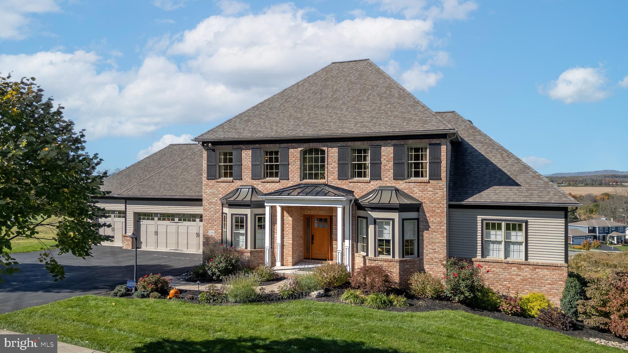 MILLION DOLLAR VIEW in STEARNS CROSSING! This stunning Single Family home located at 250 Meadowsweet Dr, State College, PA was Bachman built in 2010 and offers luxurious living in a prime location. With 4 full bathrooms and 1 half bathroom, this spacious home boasts a total finished area of 5,053 sq.ft. spread across 3 stories. Situated on a generously sized lot of 0.43 acres., this property offers ample outdoor space for relaxation and entertainment. As you approach the home, you are greeted by a beautifully landscaped front yard and a welcoming facade. Stepping inside, you are immediately struck by the craftsman style of the home, with high ceilings and an open floor plan that creates a seamless flow between the living spaces. The main level features a dining room with butler pantry, study with built-in bookcases, a family room with a fireplace, and a gourmet kitchen equipped with recently upgraded appliances, granite countertops, and a center island. The first floor also offers a master suite with a spa-like ensuite bathroom and two walk-in closets. The three bedrooms and two baths on the second floor are spacious and bright, offering plenty of space for family members or guests.  The finished basement offers plenty of open space for family gatherings, an additional bedroom and bath, a workshop, as well as a movie theatre room.  The pool table is included.  Outside, the property features a large backyard with a lower patio area with a gas fireplace, and a large main level deck, perfect for outdoor dining and entertaining.  Located in the highly desirable Stearns Crossing neighborhood in State College, this home offers a peaceful and private setting while still being close to schools, parks, shopping, and dining options.  With its modern amenities, spacious layout, and prime location, 250 Meadowsweet Dr is the perfect place to call home for those seeking luxury and comfort in State College, PA.  Call and set up your private tour today!