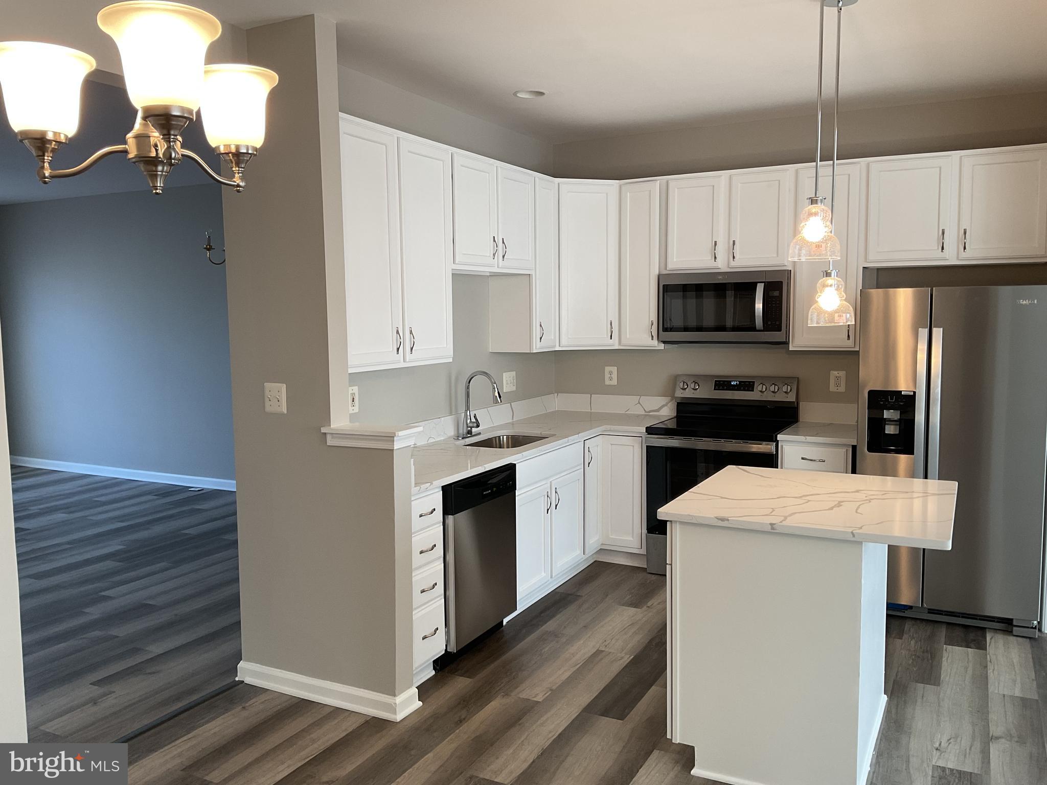 Welcome to this beautifully updated end-unit townhouse in the sought-after Kirkpatrick Farms community! Designed with both style and functionality in mind, this home has been meticulously upgraded and is ready for you to move in.

✨ Key Features:
✅ Gourmet Kitchen with quartz countertops & 42-inch cabinets
✅ Brand-new stainless steel appliances – refrigerator, stove, dishwasher & microwave
✅ Recessed lighting throughout for a modern touch
✅ Open-concept kitchen & family room with a spacious kitchen island
✅ 9-foot ceilings on the main level for an airy feel
✅ Luxury Vinyl Plank (LVP) flooring in the kitchen, family room, & basement
✅ New plush carpet for a cozy ambiance
✅ Fresh paint throughout
✅ Recently replaced HVAC
✅ 1-car garage with storage space


Enjoy all that Kirkpatrick Farms has to offer, including walking trails, community clubhouse, swimming pool, basketball courts, tennis courts parks, playgrounds and top-rated schools. Conveniently located near shopping, dining, and major commuter routes!