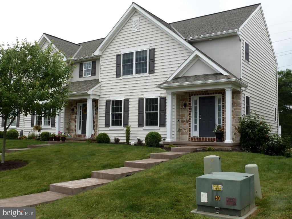 Move right in to this totally updated like new townhome in the heart of Manheim Township. Bright open floorplan with new carpet and paint throughout, hardwood floors throughout first floor, kitchen island and a finished daylight walkout basement with mudroom. Large rear deck and patio with fire pit that backs up to Neffsville park. NO SNOW AND NO MOW!