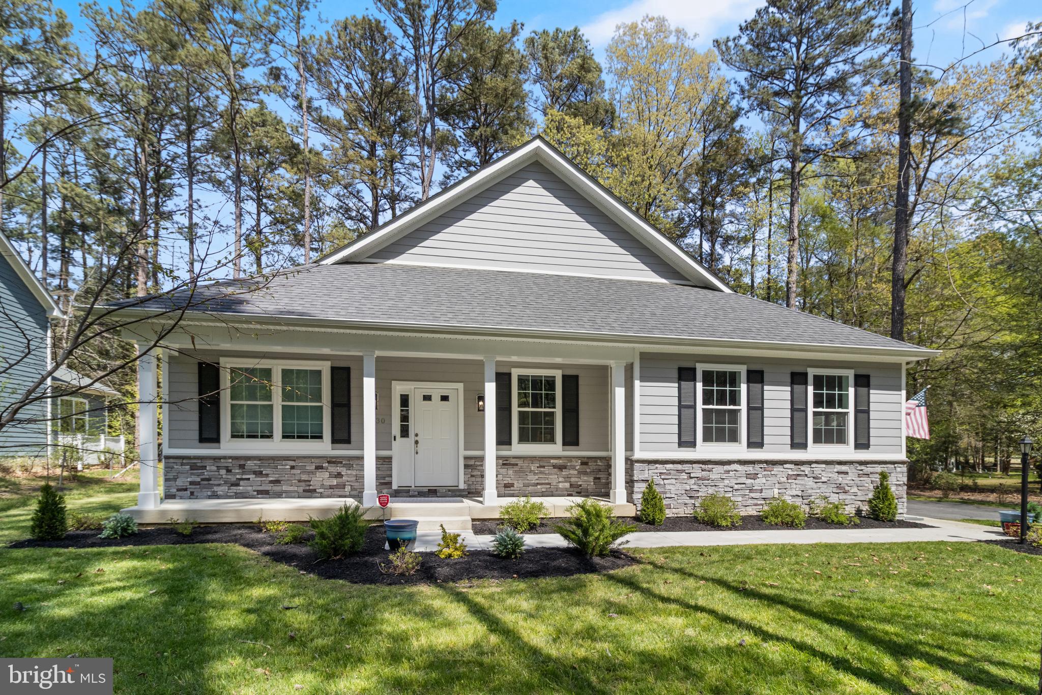 Beautiful custom-built home featuring exceptional craftsmanship and high-end upgrades throughout. The gourmet kitchen is a chef’s dream with Kitchen Aid appliances, a double convection oven, cooktop, oversized island, granite countertops, and a huge walk-in pantry. The spacious family room showcases a stunning coffered ceiling, upgraded trim package, built-in entertainment center, and a gorgeous stone fireplace. Elegant details continue throughout the home with tray ceilings, recessed lighting, and upgraded light fixtures. Each bathroom had granite and tile surrounds for a refined finish. Additional highlights include a convenient wet bar rough-in, coat storage area, and a conditioned crawl space with dehumidifier—perfect for extra storage. Step outside to enjoy the beautiful covered rear porch, ideal for relaxing or entertaining. The builder/owner  with over 40 years of experience  outdid himself on the build. Its a must see!