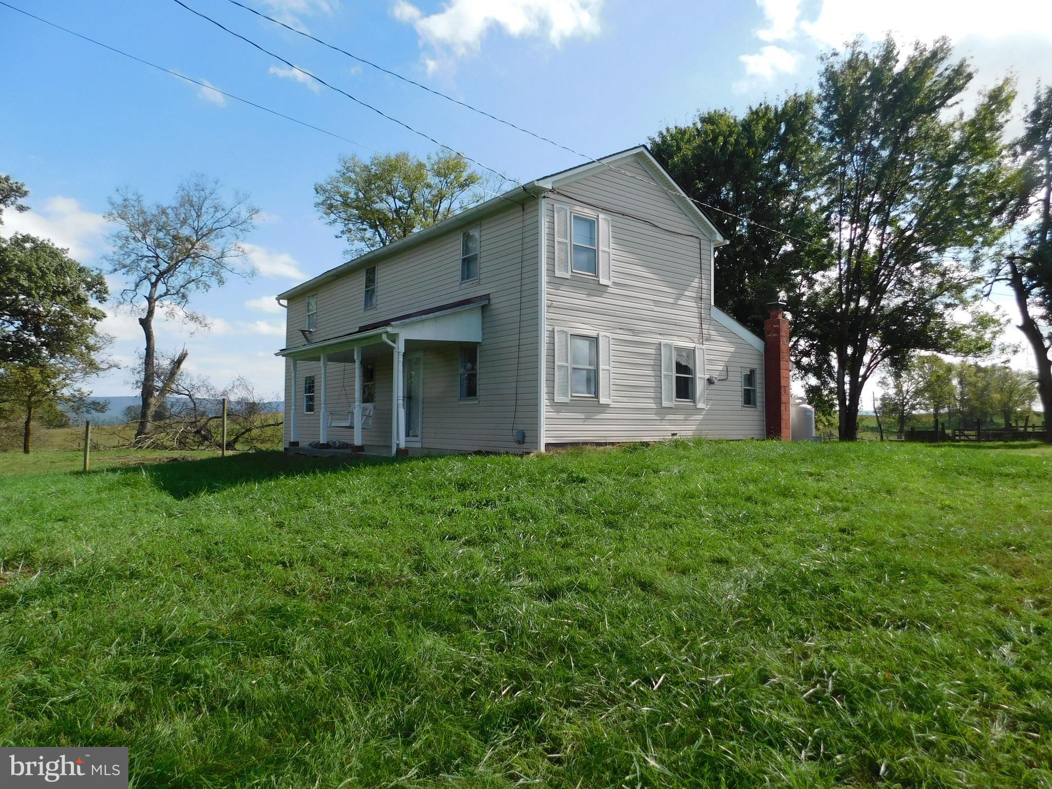 Location! Location! Location!  In WV but near the VA line between Berryville and Charles Town.  Updated 3 bedroom, 1 1/2 bath house with lvp flooring in the dining room and family room.  Enjoy the mountain and pasture views from either the large Trex deck off the family room or the front porch - complete with porch swing!   The 3 bedrooms have new carpet and the full bath is remodeled.  Tenant has use of only the area directly around the house - not the entire property.  No pets.  No smoking.   Please shut gate after entering the lane.