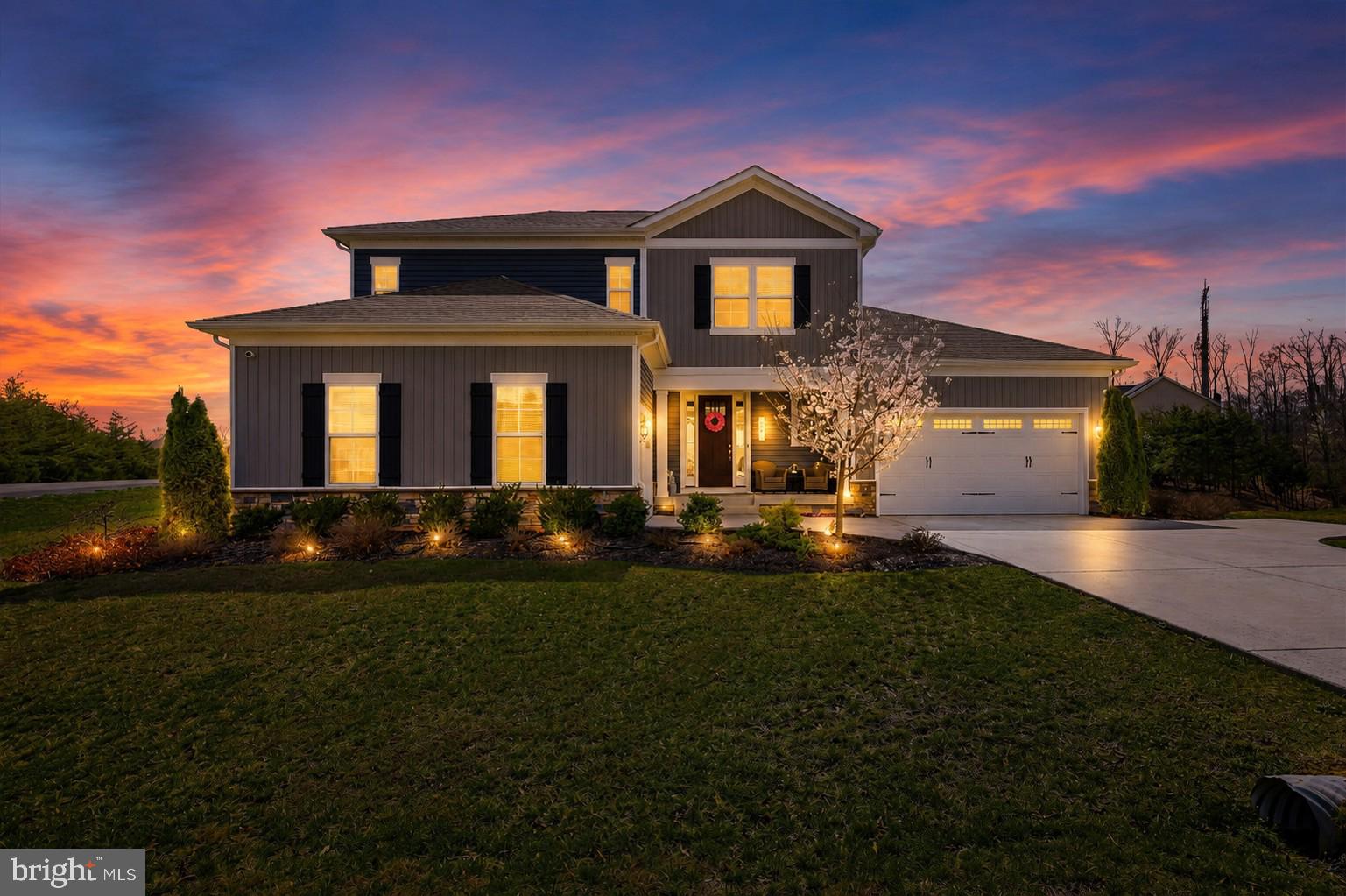 PRICED BELOW APPRAISED VALUE!
Originally selected as the builder's showcase model home, this exceptional luxury residence offers over 4,500 finished square feet of thoughtfully designed living space filled with premium upgrades, custom finishes, and meticulous attention to detail. Perfectly situated on a premium .48-acre corner lot in the highly sought-after Blue Ridge Shadows Golf Course Community adjacent to Hole #4, this remarkable property offers enhanced privacy, beautiful mountain views, outstanding curb appeal, and a setting that is truly second to none.

Lovingly maintained and extensively improved, this home showcases numerous updates and enhancements that allow the next owner to move in with confidence. Even better, the HVAC system is covered by a transferable annual service agreement, and the accumulated service points will convey to the new owner, providing valuable future credits toward maintenance, repairs, or system upgrades.

Designed with both luxury and functionality in mind, the home features one of today's most desirable floor plans with THREE PRIVATE BEDROOM SUITES, including a luxurious main-level Owner's Suite and an additional main-level bedroom with a full bath. This sought-after layout provides exceptional flexibility for multi-generational living, long-term guests, aging family members, or those seeking main-level living without sacrificing space.

The spacious Owner's Suite serves as a private retreat, offering generous proportions, spa-inspired comfort, and convenient main-level accessibility. A second main-level bedroom and full bath create the perfect guest accommodations, home office, or private living space.

At the heart of the home, the gourmet kitchen and expansive great room were designed for entertaining and everyday living alike. Featuring quartz countertops, upgraded cabinetry, a custom pantry, designer lighting, and oversized gathering spaces, the home blends elegance with comfort. Custom feature walls, shiplap accents, upgraded paint selections, and designer touches throughout create a level of warmth and character rarely found in newer construction.

Upstairs, two oversized bedroom suites each enjoy their own private en-suite bathroom and spacious walk-in closet, providing exceptional comfort and privacy for family members or guests. The centrally located loft offers endless flexibility as a home office, media room, reading lounge, study area, playroom, or additional living space.

The finished lower level expands the home's versatility with a large recreation room, additional bedroom, full bathroom, and built-in cabinetry, creating the perfect space for entertaining, extended guest stays, hobbies, fitness, gaming, or a private retreat.

Additional highlights include a rare and highly functional garage configuration featuring an attached two-car garage plus a separate one-car garage—ideal for additional vehicles, golf gear storage, workshop space, home gym equipment, or extra storage.

Offering 5 bedrooms, 5 full bathrooms, a grand foyer, mudroom, main-level laundry room, custom finishes throughout, and an exceptional floor plan, every inch of this home was designed with comfort and livability in mind.

Step outside to enjoy the spacious Trex deck overlooking the fully fenced backyard and beautiful mountain views. Whether hosting gatherings, enjoying quiet evenings, or letting pets play safely, the outdoor living spaces are every bit as impressive as the interior. Professional landscaping and carefully curated exterior details complete this truly one-of-a-kind showcase home in Blue Ridge Shadows.

Luxury, flexibility, extensive upgrades, breathtaking views, and an unbeatable golf course community location—this is the home that checks every box.