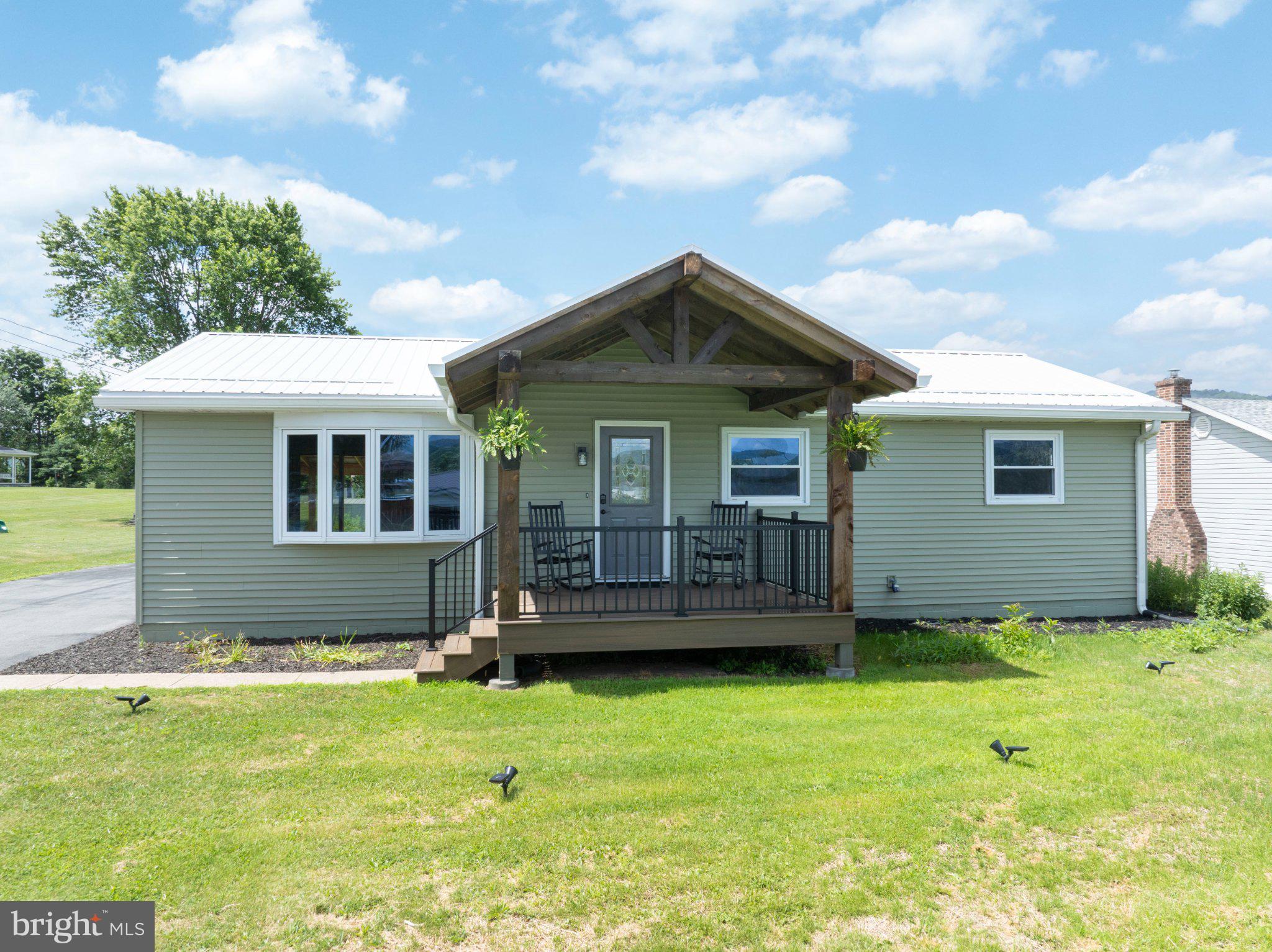 OPEN HOUSE: Sun, Jun 28 1:00 PM - 2:00 PM | Enjoy the summer breeze rocking away on this lovely covered porch. This ranch beauty with an open floor plan featuring the kitchen, dining room, and living room is just waiting for gatherings, with a beautiful view of the fireplace.

The kitchen has easy-close drawers and an island with extra storage in a modern style. Stainless steel appliances and a new faucet that extends like a rain shower make this a kitchen any chef would love to cook in. Double sliding doors off the dining area open to a large covered patio and a double lot.

Three bedrooms feature plank flooring, and the updated bathroom includes a shower door. The lovely, spacious lower rec room has a handcrafted barn door made by the owner, perfect for extra entertaining. There is also a half bath and a storage room or workshop.

Nothing to do but move right into this beauty—just call the movers and start packing!

See you Sunday, 6/21/2026, from 2:30 to 3:30.