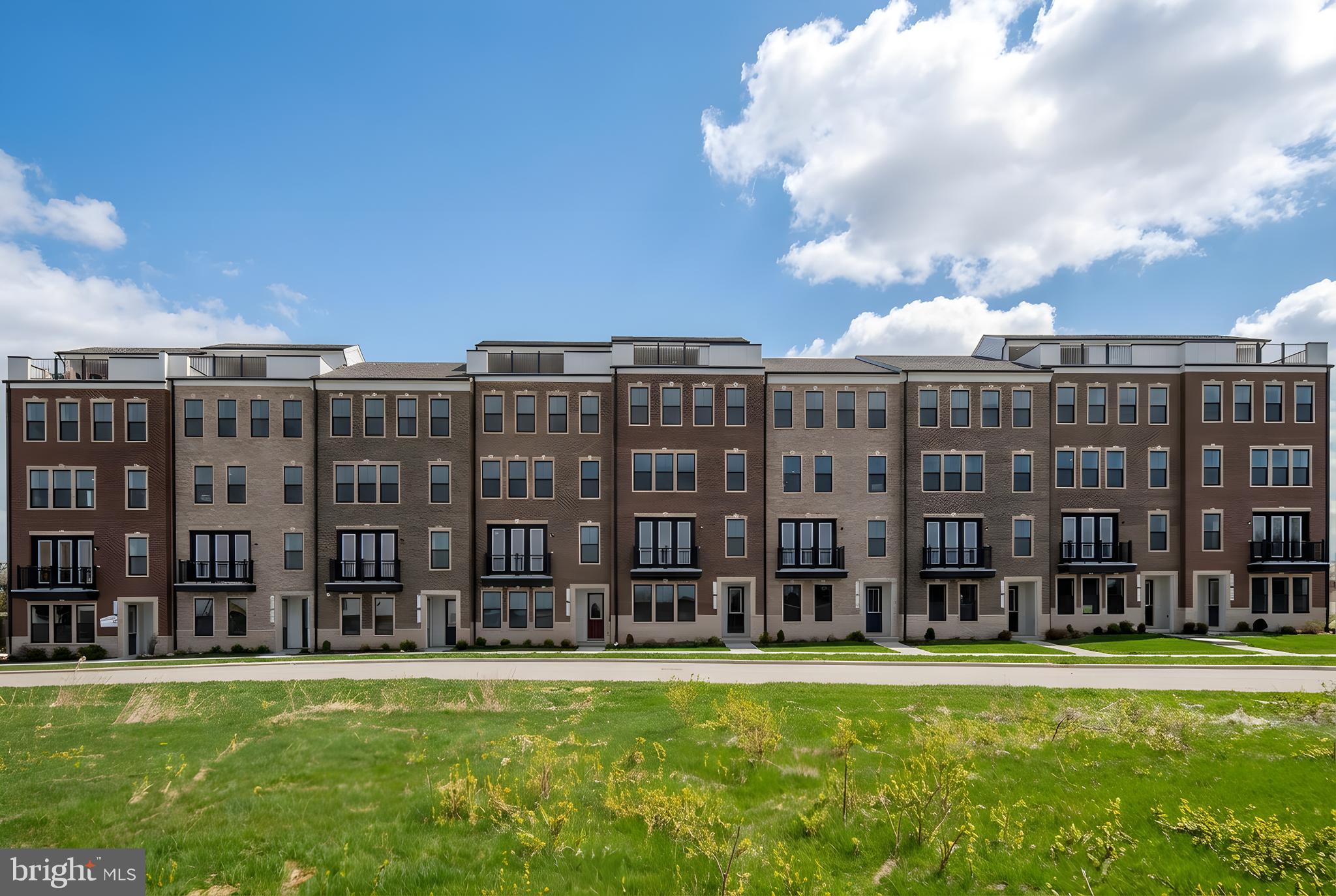 Welcome to modern, low-maintenance living in this new-build townhome-style condominium located in the amenity-rich Goose Creek Village community in Ashburn, VA. 

Designed with today’s lifestyle in mind, this spacious 3-bedroom, 2.5-bath home offers an attached garage, an open-concept floor plan, and multiple outdoor living spaces, including a private rooftop terrace perfect for entertaining, relaxing, or enjoying fresh air right at home. The main living level features a bright and inviting family room that flows seamlessly into the dining area and stylish kitchen. The kitchen is beautifully appointed with a large center island, quartz countertops, stainless steel appliances, and a walk-in pantry, creating an ideal space for everyday living and hosting guests. 

The private primary suite offers a peaceful retreat with its own outdoor balcony, two generous walk-in closets, and a spa-inspired ensuite bath featuring a dual vanity, separate shower, and private water closet. A versatile loft area, full bath, and dedicated laundry room add comfort and convenience to the upper level. 

With walkable access to shopping, dining, community amenities, trails, recreation spaces, and convenient commuter routes, this new construction condominium offers the perfect blend of urban style, everyday function, and Ashburn convenience.