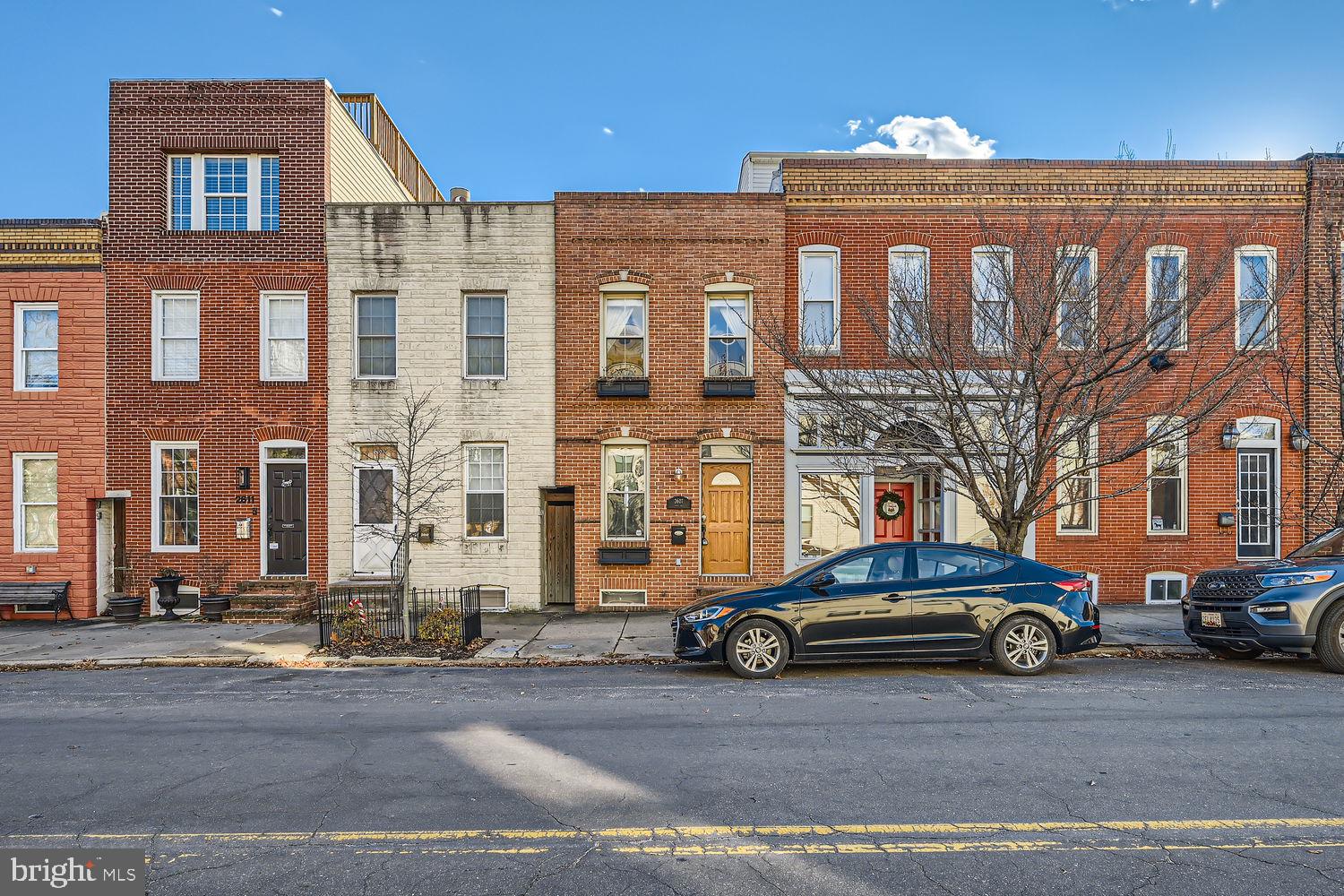 Welcome to 2607 Fait Avenue, a beautifully maintained rowhome located in the heart of Baltimore’s vibrant Canton neighborhood. This charming residence offers 1,222 square feet of modern living space, including two spacious primary bedrooms, each with its own en-suite bathroom for unmatched comfort and privacy.

From the moment you step inside, you’ll be welcomed by an open floor plan adorned with exposed brick walls and gleaming hardwood floors, exuding warmth and character. The living room flows seamlessly into the dining area, both enhanced by recessed lighting. The gourmet kitchen is a chef's dream, featuring stainless steel appliances, granite countertops, a stylish tile backsplash, and gas cooking. Step through the kitchen to a private rear patio, enclosed by a tall privacy fence, perfect for outdoor gatherings or quiet relaxation.

Upstairs, the first primary bedroom impresses with a unique barrel ceiling, plush carpeting, and a convenient laundry closet. Its en-suite bathroom includes a luxurious Jacuzzi tub, providing a perfect retreat at the end of the day. The second primary bedroom showcases hardwood floors, recessed lighting, and a sophisticated bathroom with a tiled shower. The unfinished lower level offers ample storage space, making this home as practical as it is elegant.

This residence effortlessly blends historic charm with modern upgrades, and tenants can enjoy the convenience of the existing furniture or opt for it to be removed before moving in.

Location is everything, and 2607 Fait Avenue truly excels! Situated just steps from Canton’s top dining, shopping, and nightlife destinations, this home also offers easy access to the scenic waterfront, major commuter routes, parks, and local attractions. Whether you’re commuting, exploring, or simply relaxing, you’ll find everything you need just minutes away. A minimum Credit Score of 650 is required.