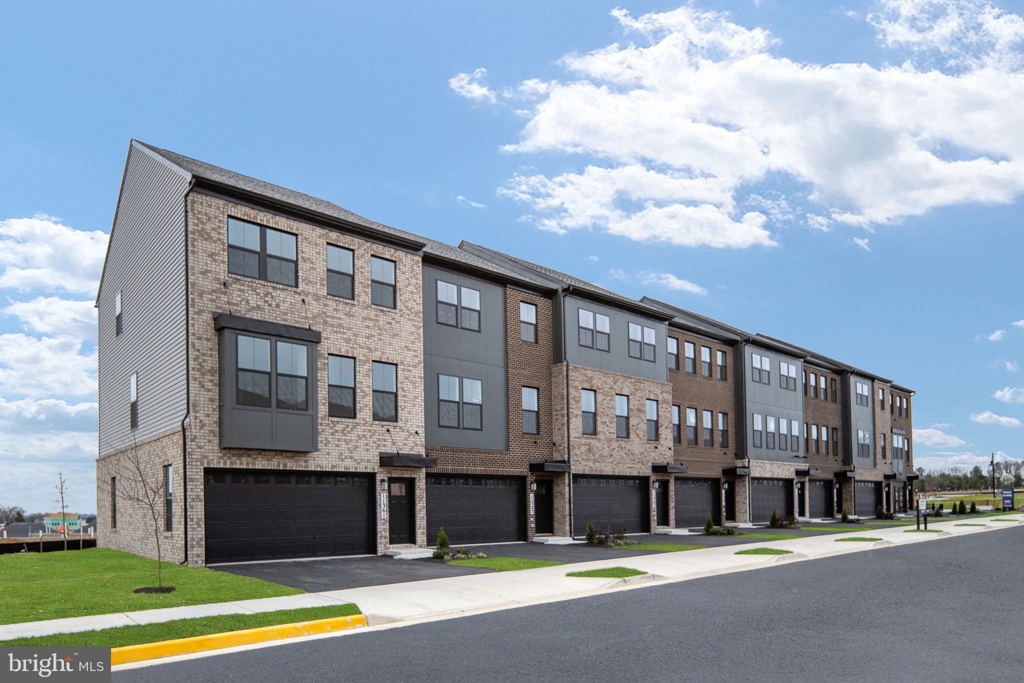 Ready to move in this September. End Unit. Experience D.R. Horton's newest community, Innovation Town Center, featuring thoughtfully designed 22' wide three-level townhomes built for today's lifestyle. These homes offer 2,270 sq. ft. with 3 upper bedrooms and a basement bedroom with full bath for your convenience. Complete with 3.5 baths, a 2 car front entry garage, a 15'x8' rear deck, and private backyard space. Each townhome includes D.R. Horton's signature America's Smart Home Package and professionally curated interior design palettes. The open-concept main level showcases modern finishes and adaptable spaces perfect for working, relaxing and entertaining. 
*Photos, 3D tours, and videos are representative of plan only and may vary as built.