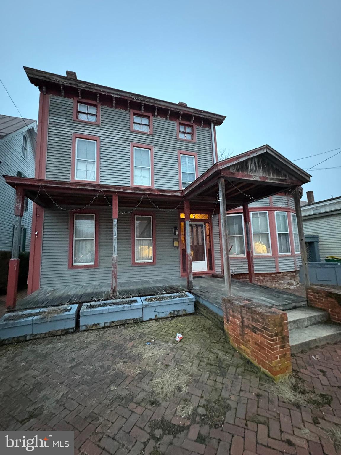 5BR/2BA Victorian on 3 levels offers space, character & possibilities. Features detached garage, rear drive, large yard. Multiple options for renovation, restoration or creative conversion. Flexible layout accommodates various uses. Solid opportunity, desirable location. Sold as-is. Ideal for an investor or buyer with vision. Schedule your showing today!
