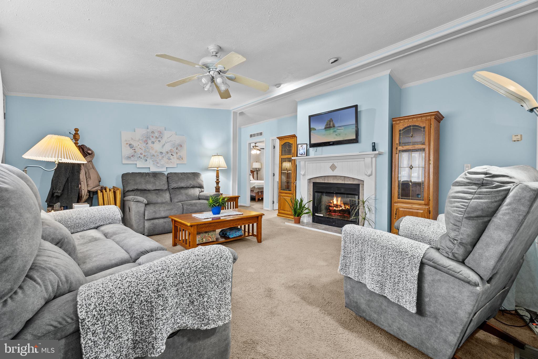 Motivated sellers...Experience relaxed coastal living in this inviting 3‑bedroom, 2‑full‑bath home located in the sought‑after Pot‑Nets Lakeside community. Enjoy a cozy living room with fireplace and a peaceful screened‑in porch perfect for unwinding and taking in the outdoor sounds. The community offers multiple pools, nature trails freshwater ponds and lakes, community center and an active HOA with plenty of activities, making it easy to enjoy a fun, connected lifestyle. Comfort, charm, and coastal convenience all come together here. Low lot rent $900.01.