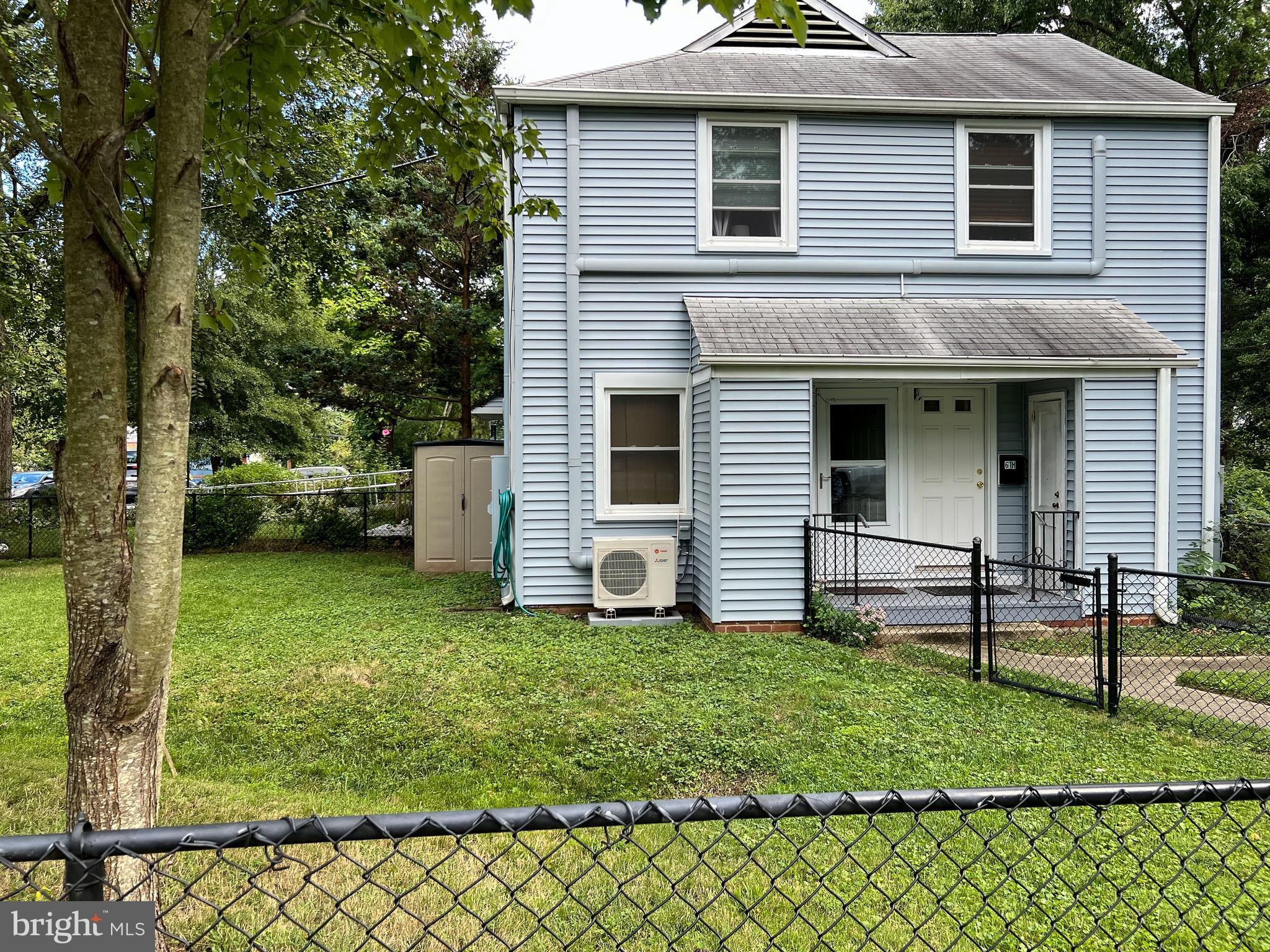 Lovely upper level home has been updated with new siding, upgraded insulation in attic, and split system heat pump. Includes a stacked full size washer/dryer. Updated windows, doors, baseboard heat, Beautiful hardwood floors, & a very spacious fenced yard! Assigned parking space directly in front of home! Monthly co-op fee includes property taxes, insurance, trash pick-up & most structural maintenance. Walk or bike to Roosevelt Center, groceries, restaurants, pools & Greenbelt's many public parks.  Buddy Attick Park and Greenbelt Lake provide picnic areas and fishing. Easy access to 295 & 495 take you to DC, Annapolis or Baltimore, plus Metro is just a couple of miles away.